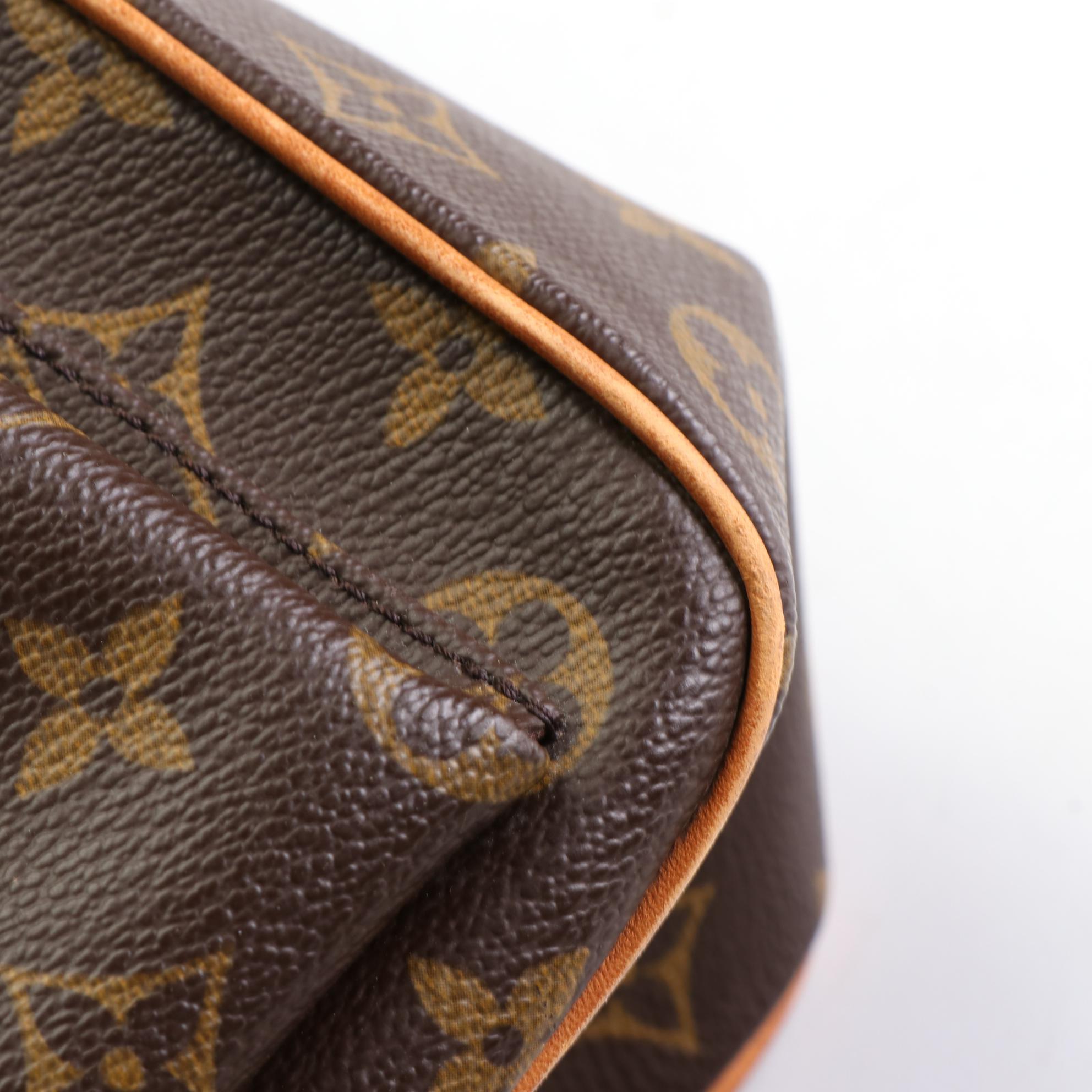 Louis Vuitton Multipli Cite Handbag in Monogram Canvas and Vachetta Leather