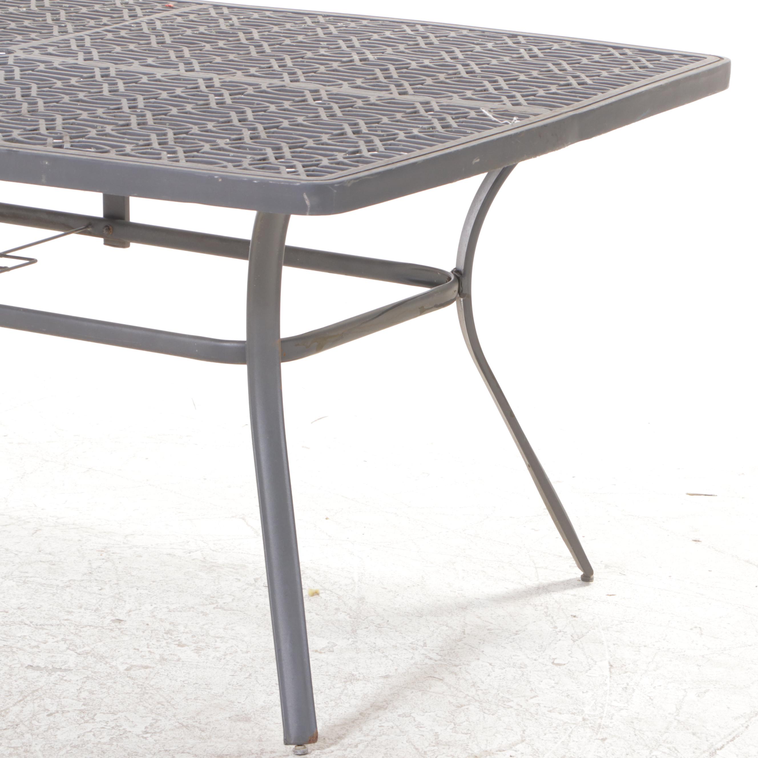 Seven-Piece Cast Metal Patio Dining Set with Umbrella