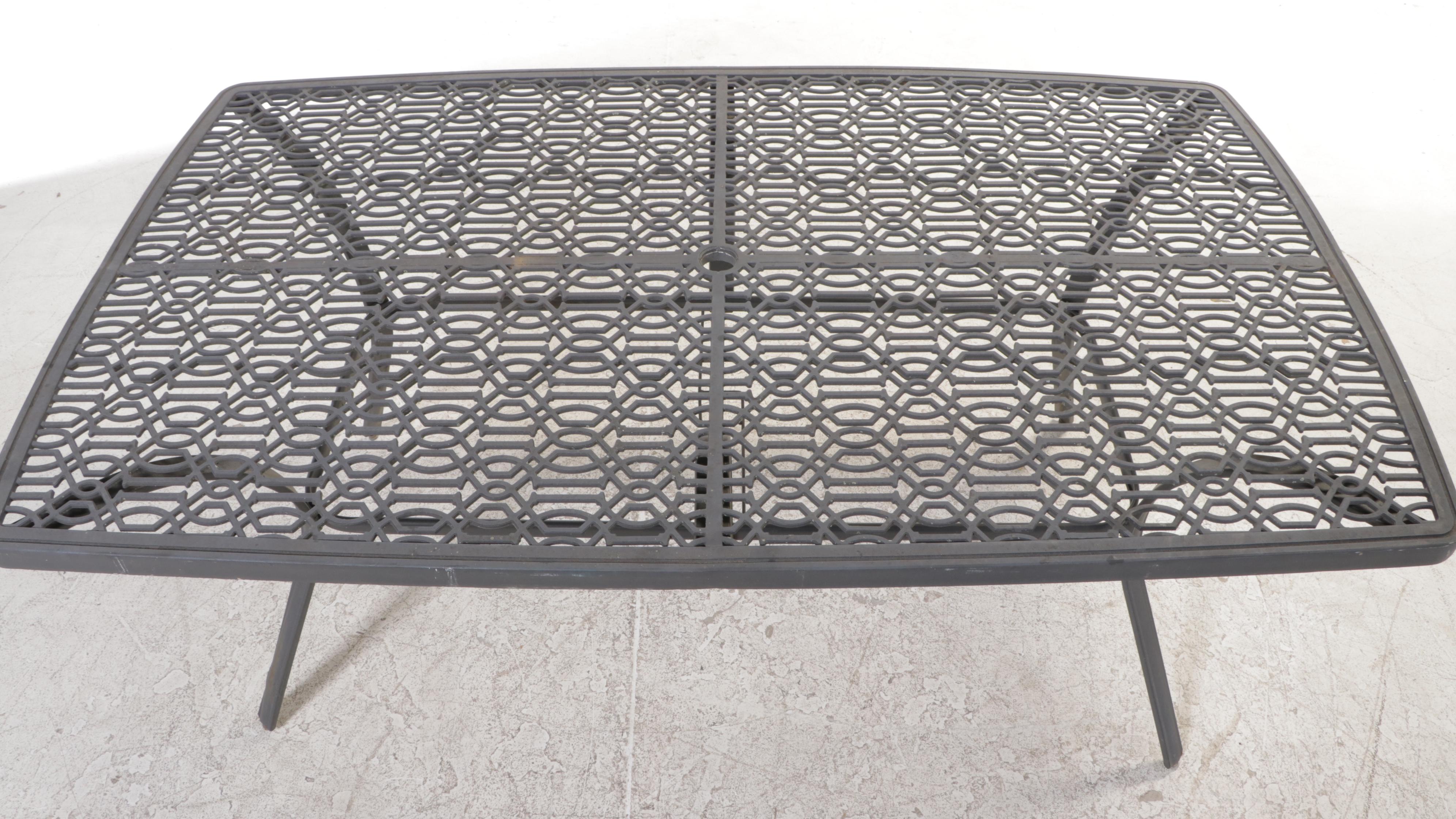 Seven-Piece Cast Metal Patio Dining Set with Umbrella