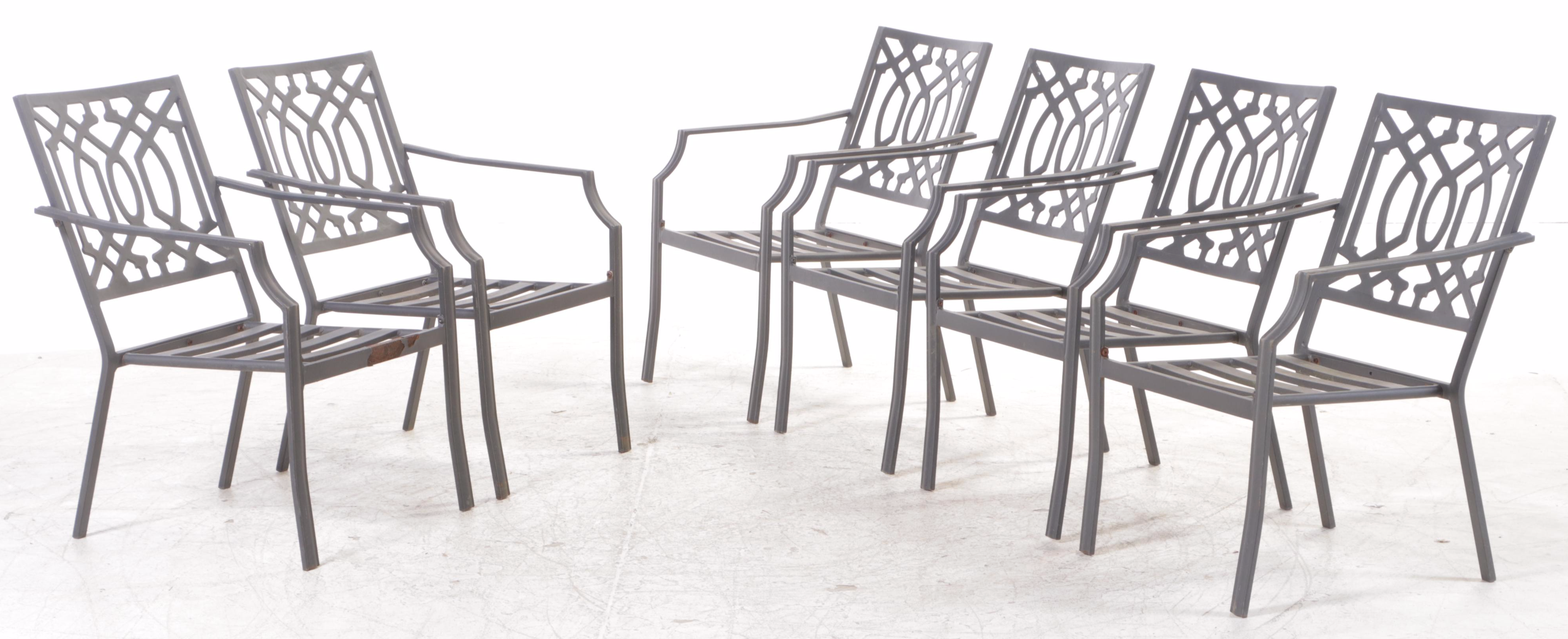 Seven-Piece Cast Metal Patio Dining Set with Umbrella