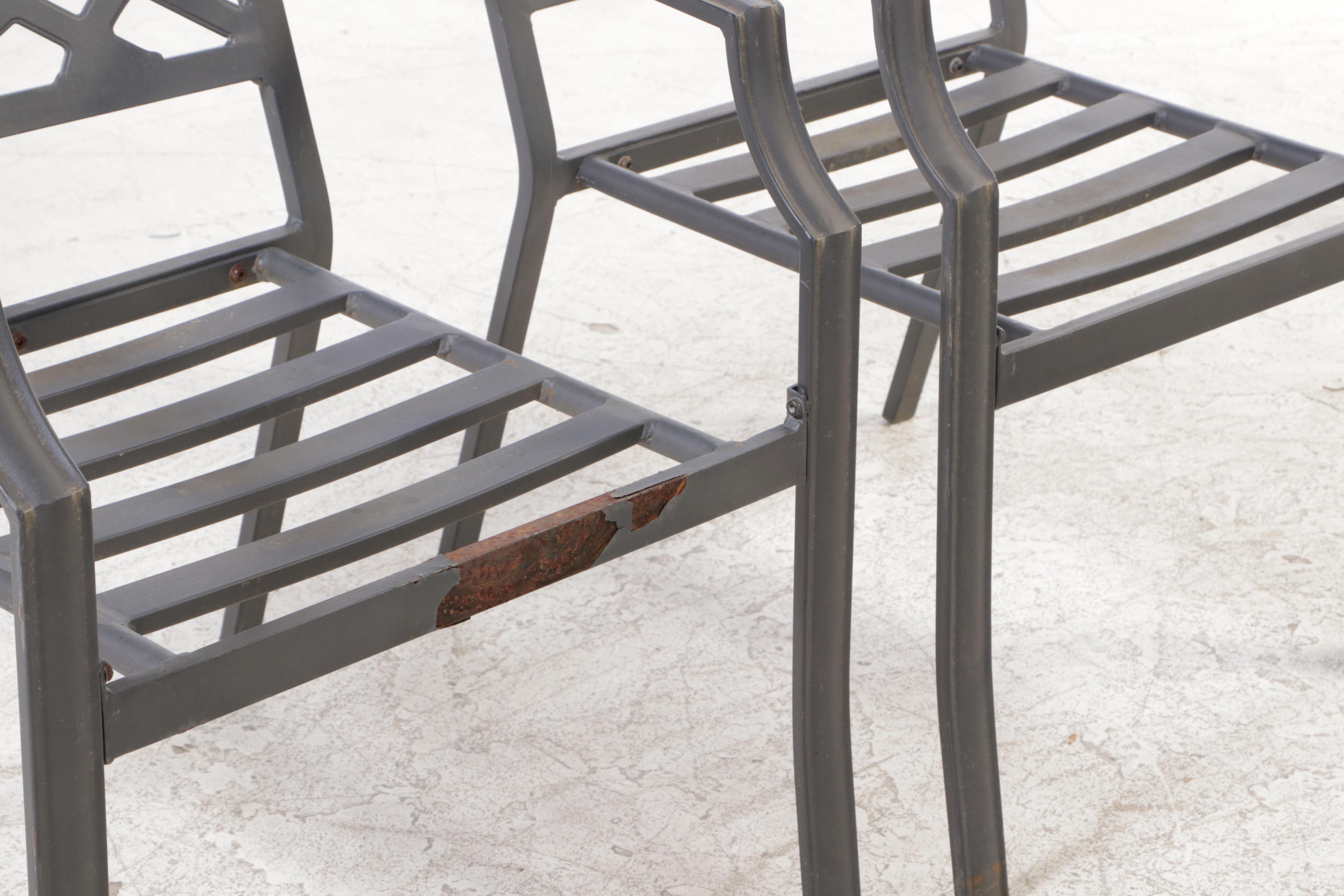 Seven-Piece Cast Metal Patio Dining Set with Umbrella