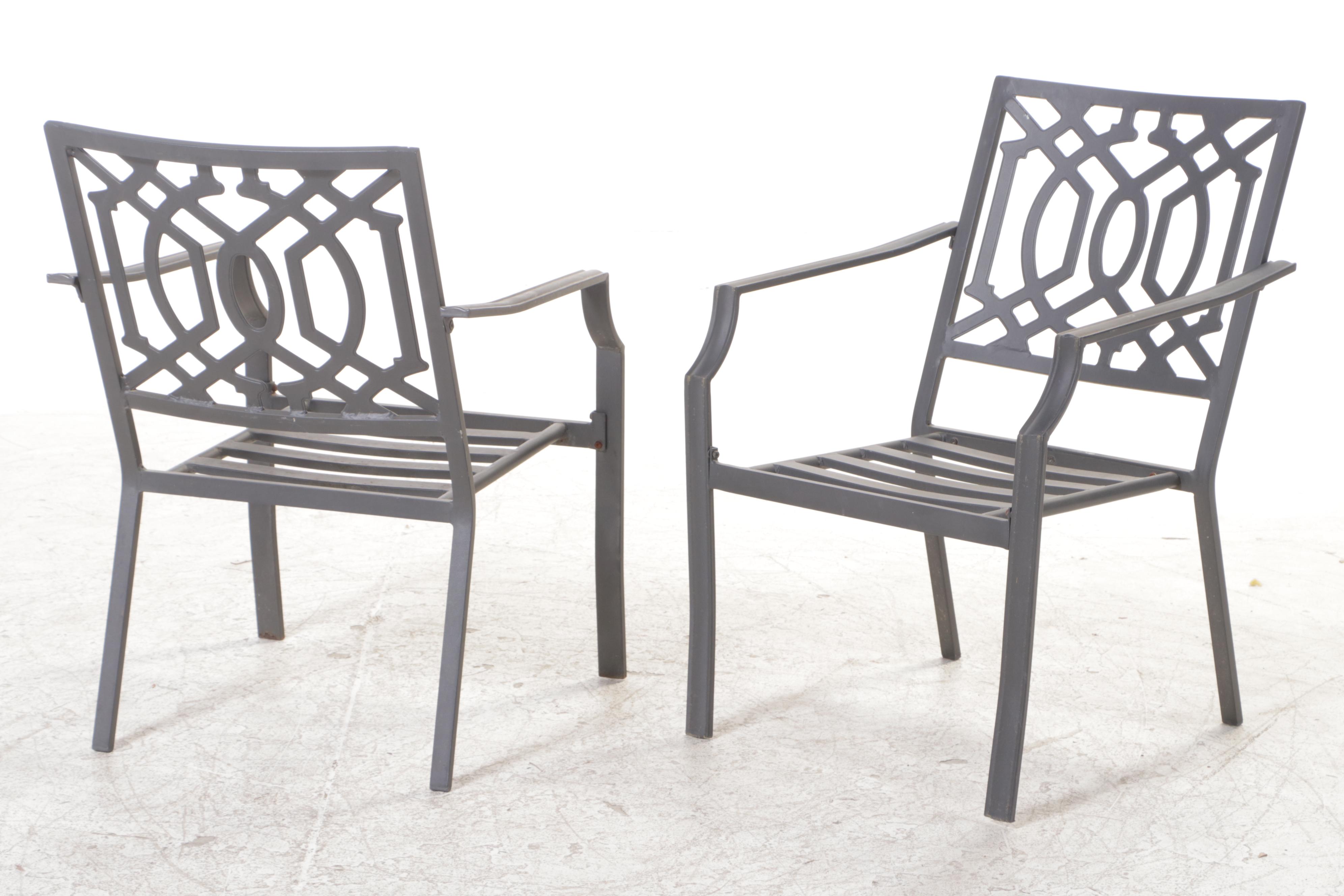 Seven-Piece Cast Metal Patio Dining Set with Umbrella