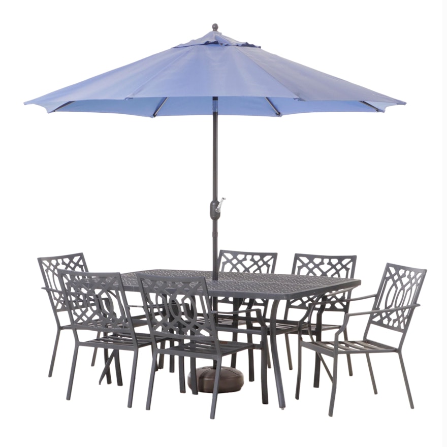 Seven-Piece Cast Metal Patio Dining Set with Umbrella