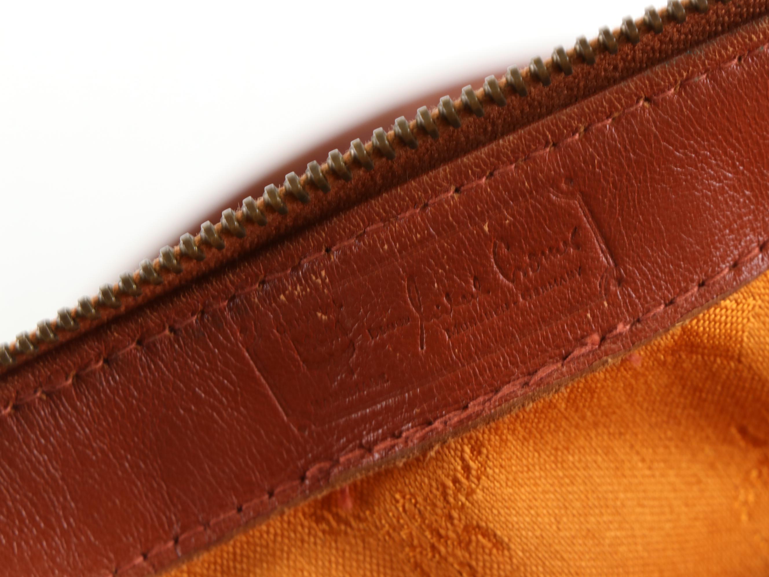 MCM München Boston Bag in Cognac Monogram Visetos Canvas and Brown Leather