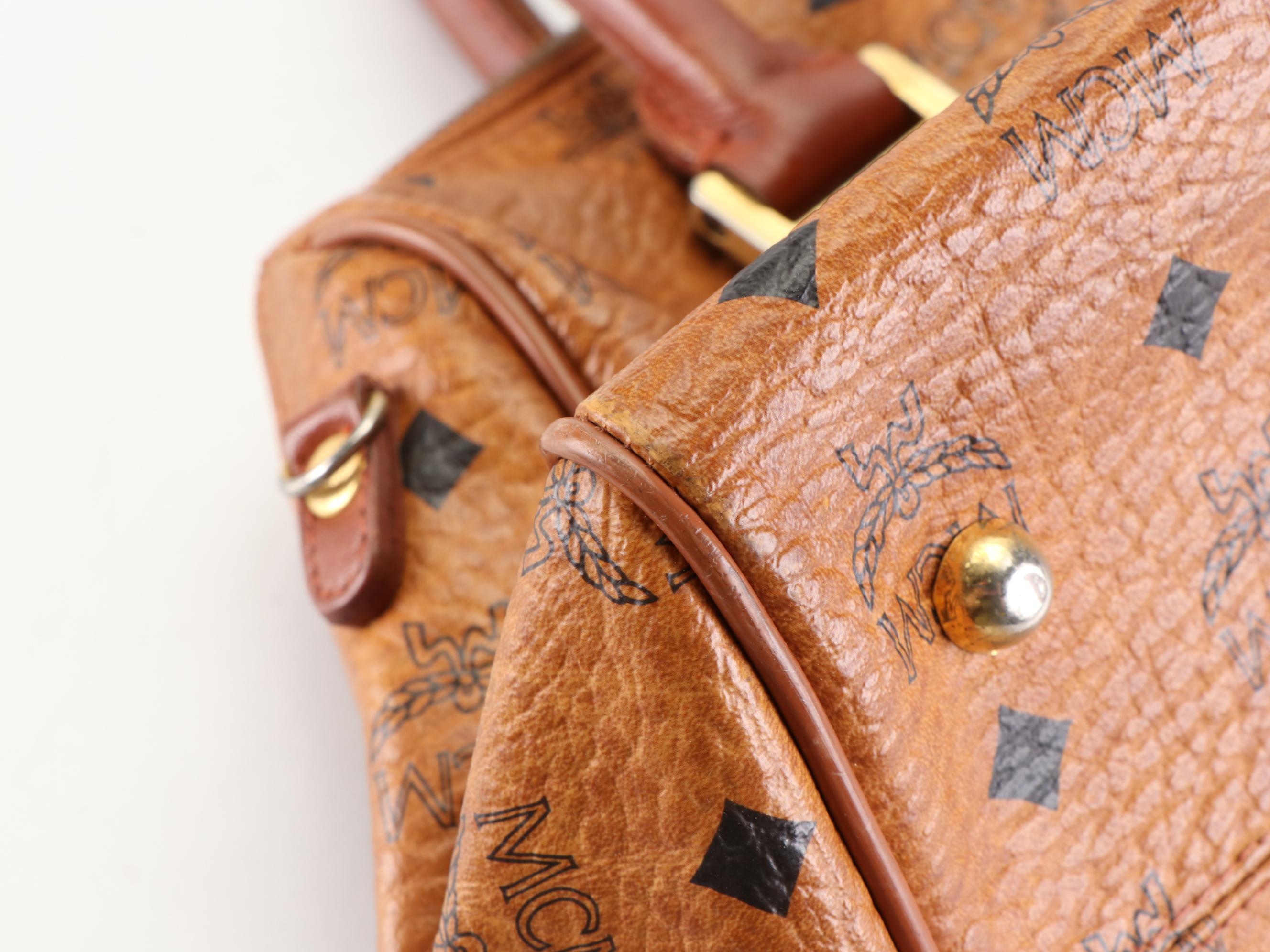 MCM München Boston Bag in Cognac Monogram Visetos Canvas and Brown Leather