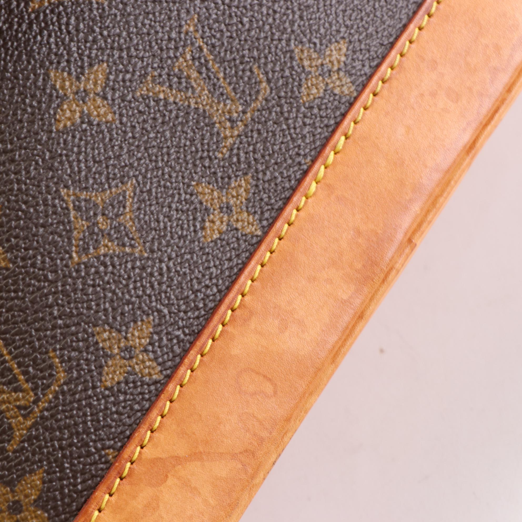 Louis Vuitton Alma PM Satchel in Monogram Canvas and Vachetta Leather