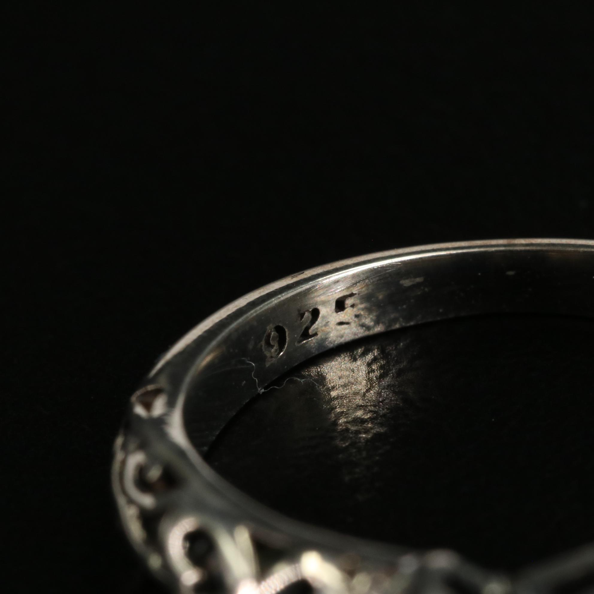 Sterling Garnet Scrollwork Ring