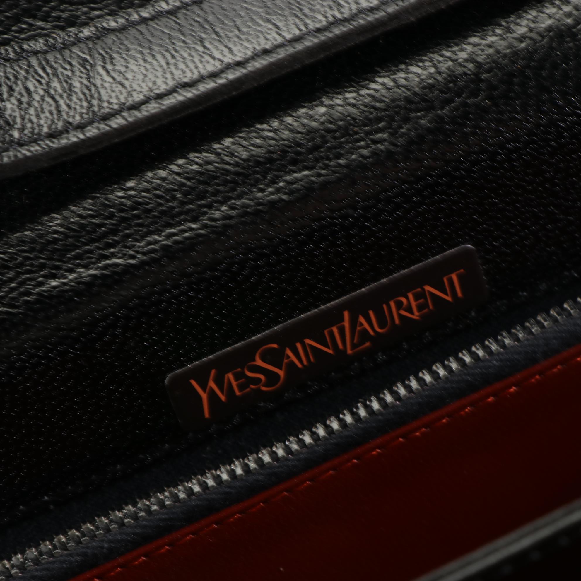 Yves Saint Laurent Convertible Clutch in Lizard Skin/Leather with Brogue Detail