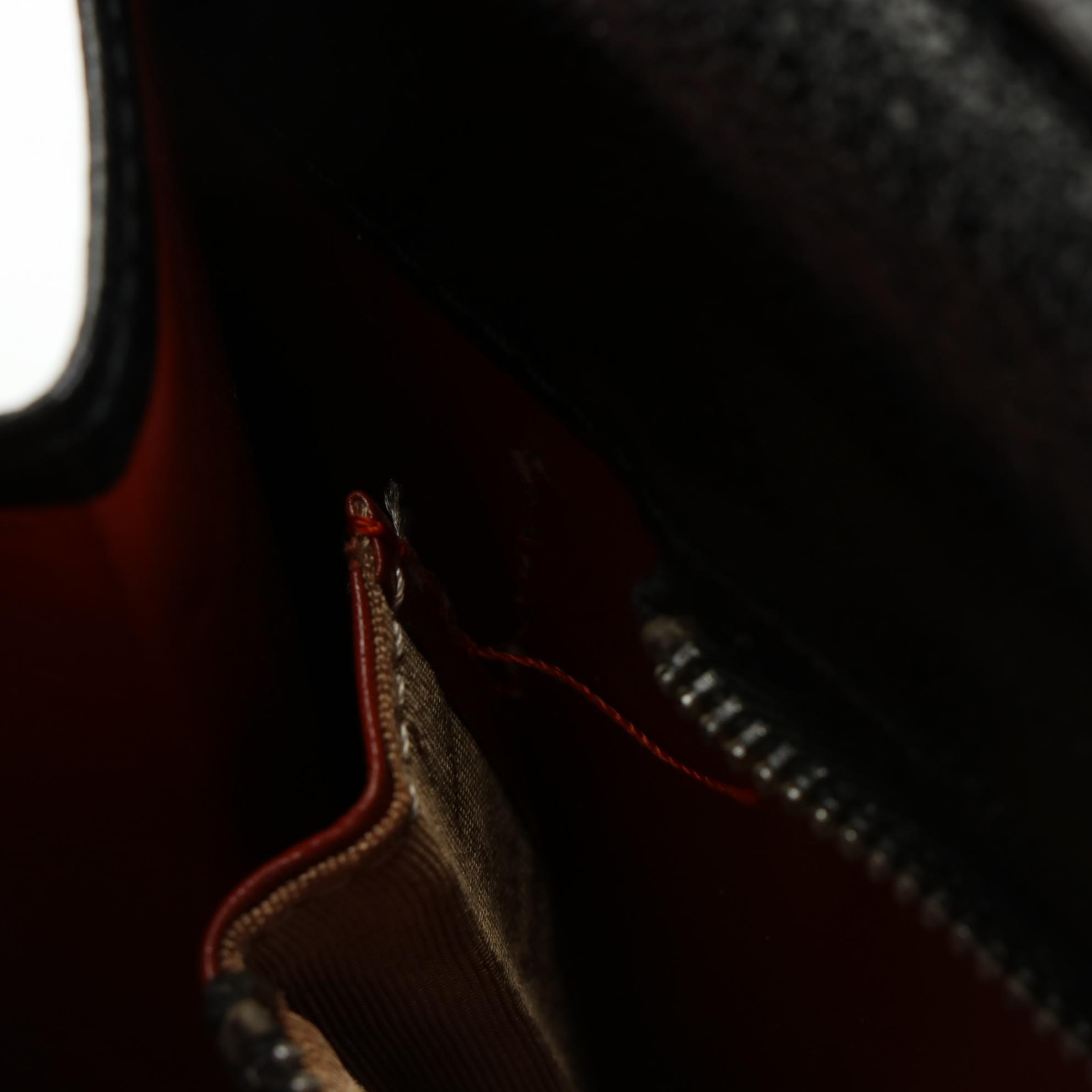 Yves Saint Laurent Convertible Clutch in Lizard Skin/Leather with Brogue Detail