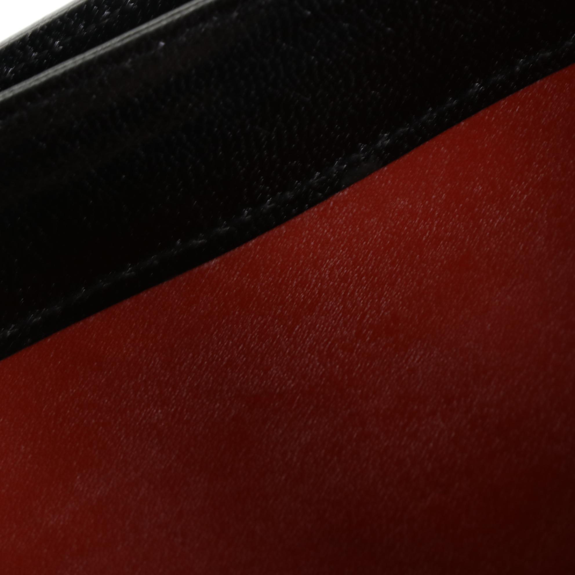 Yves Saint Laurent Convertible Clutch in Lizard Skin/Leather with Brogue Detail