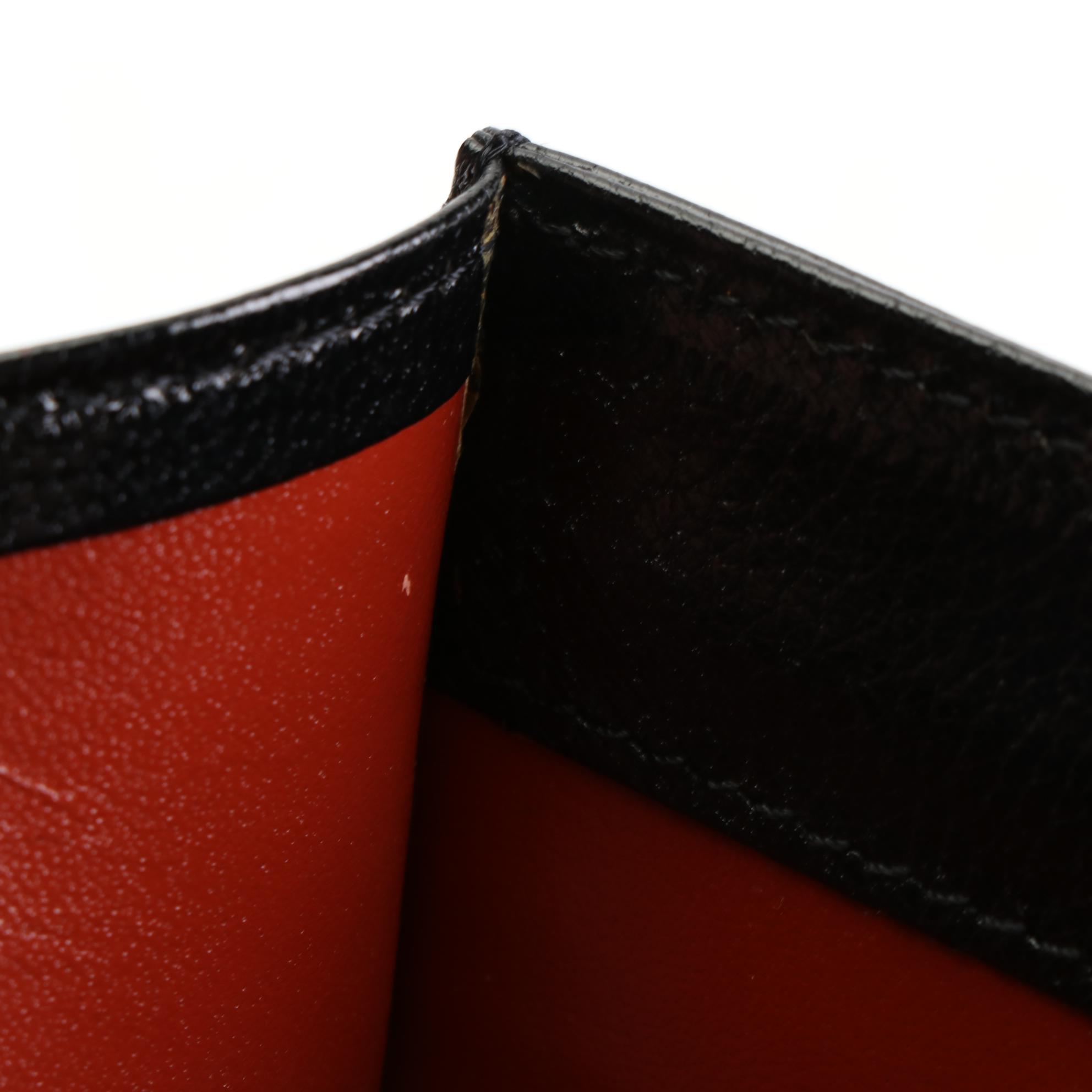 Yves Saint Laurent Convertible Clutch in Lizard Skin/Leather with Brogue Detail