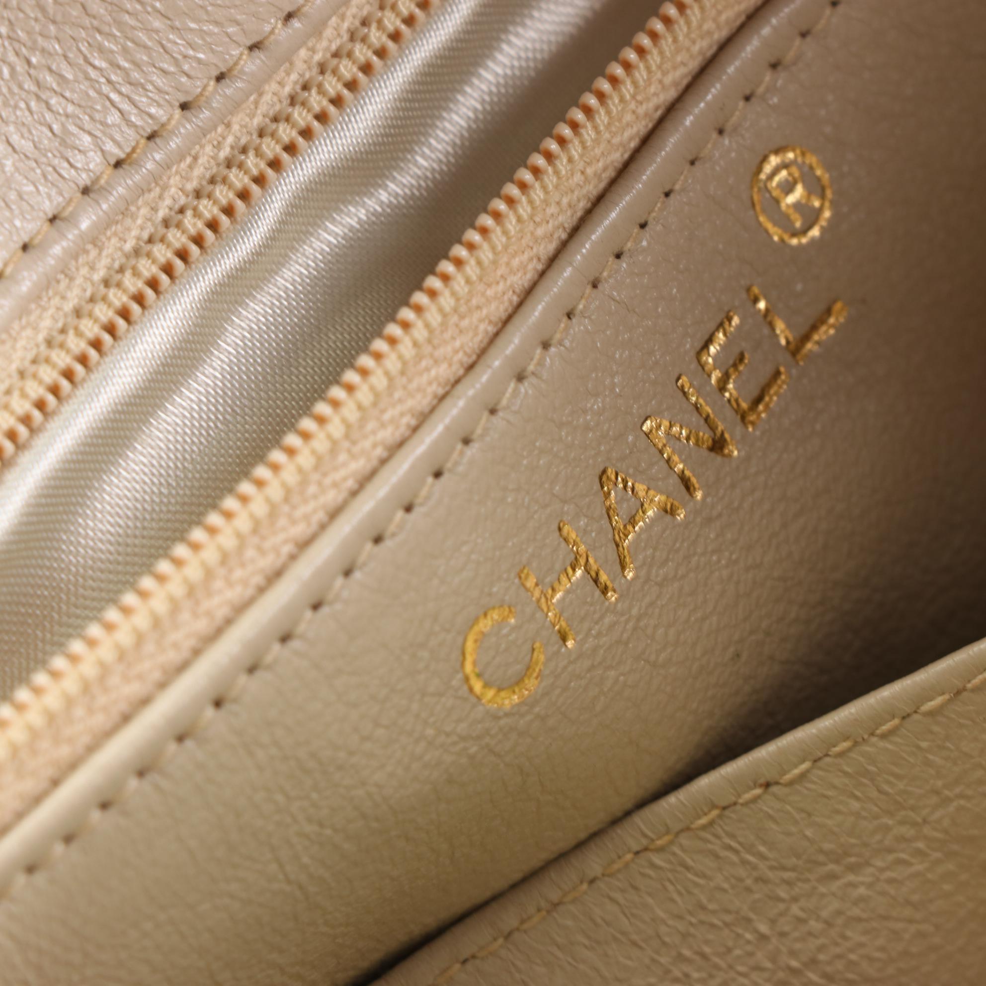 Chanel Front Pocket Top Zip Shoulder Bag in Lambskin Leather