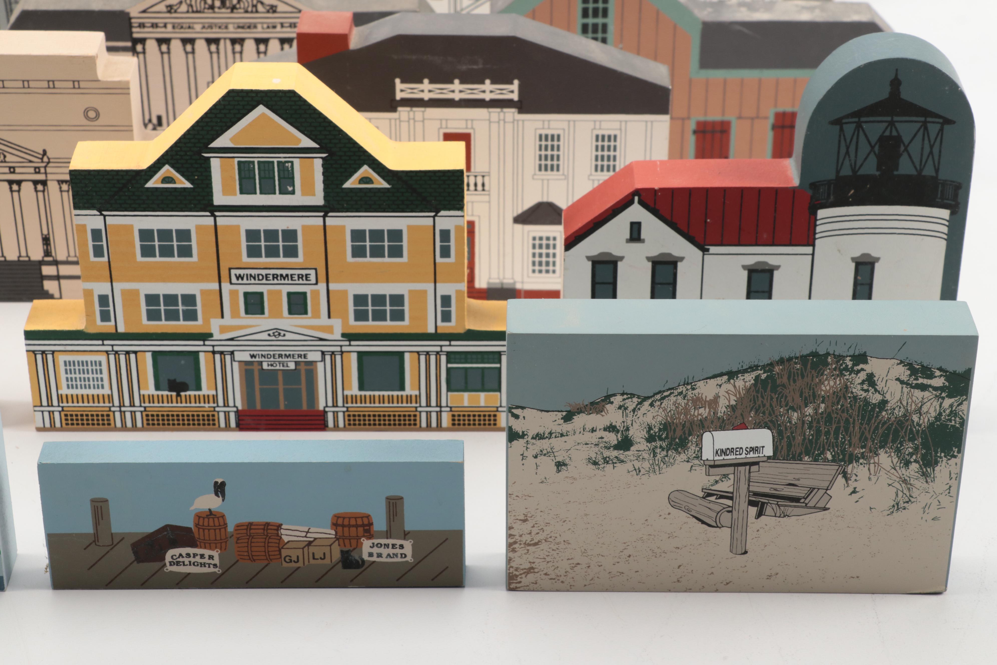 The Cat's Meow with Other Lighthouses and More Wooden Souvenir Figures