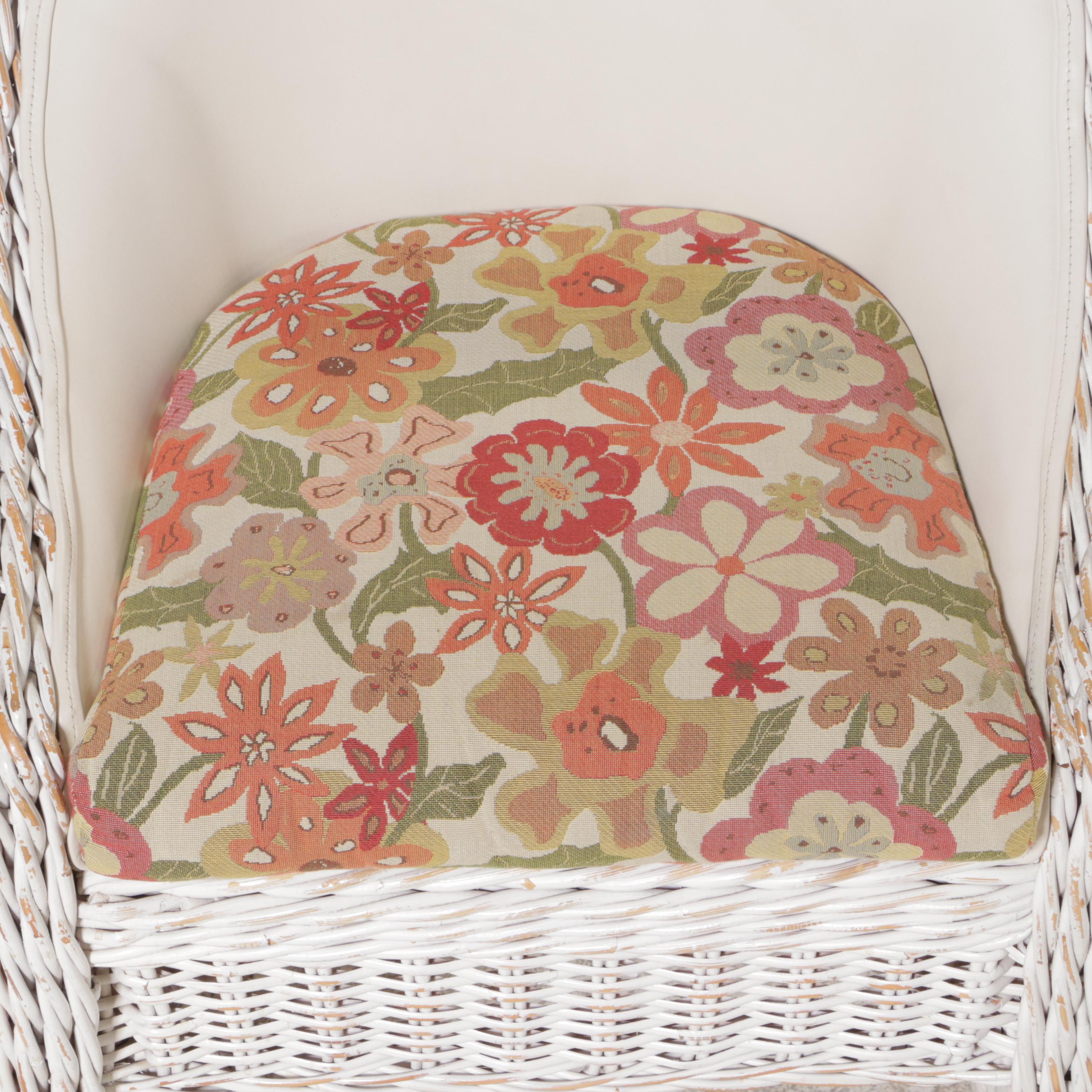 Three Wicker and Upholstered Armchairs