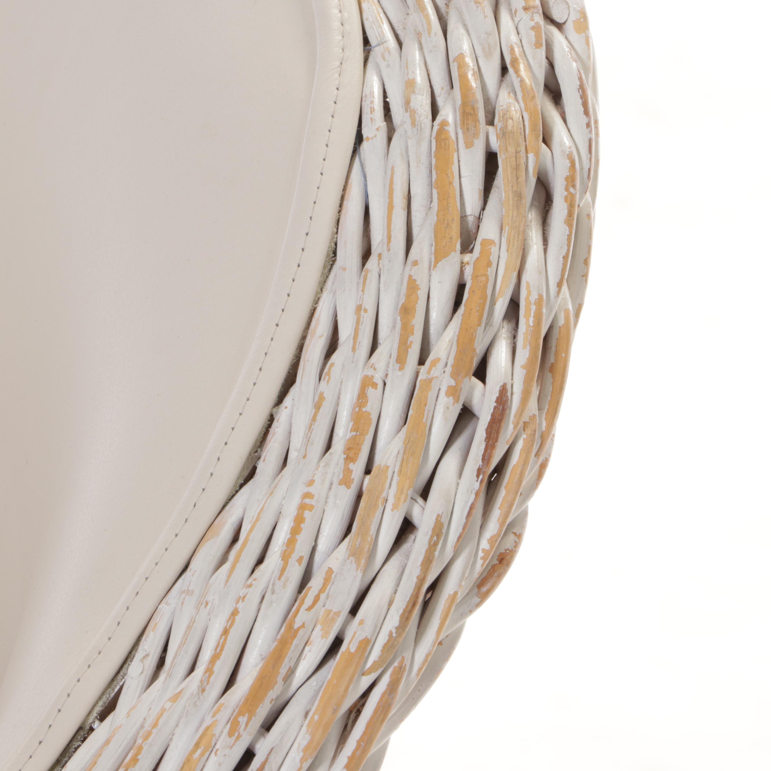 Three Wicker and Upholstered Armchairs