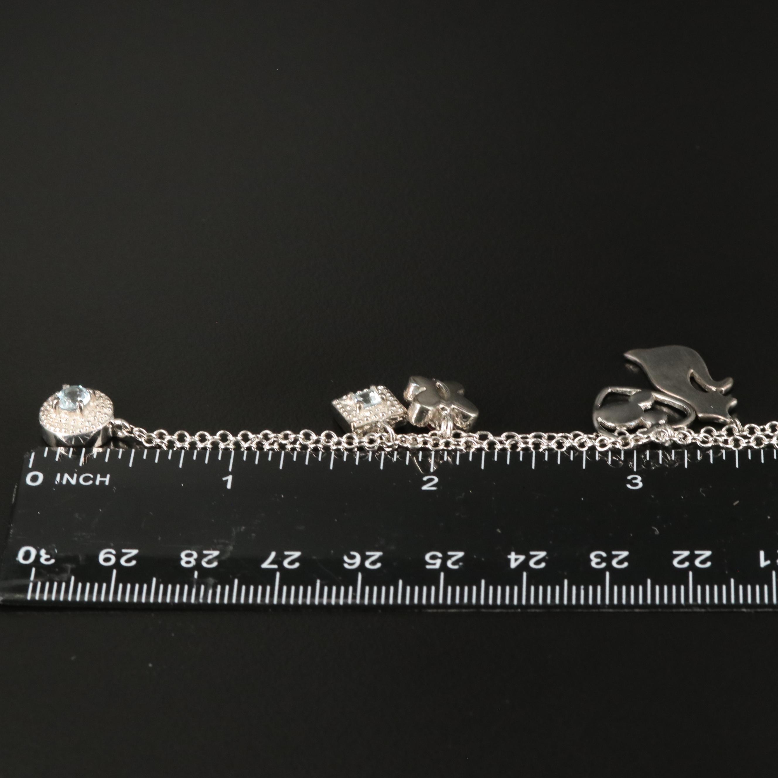 Sterling Garnet and Blue Topaz Charm Necklace