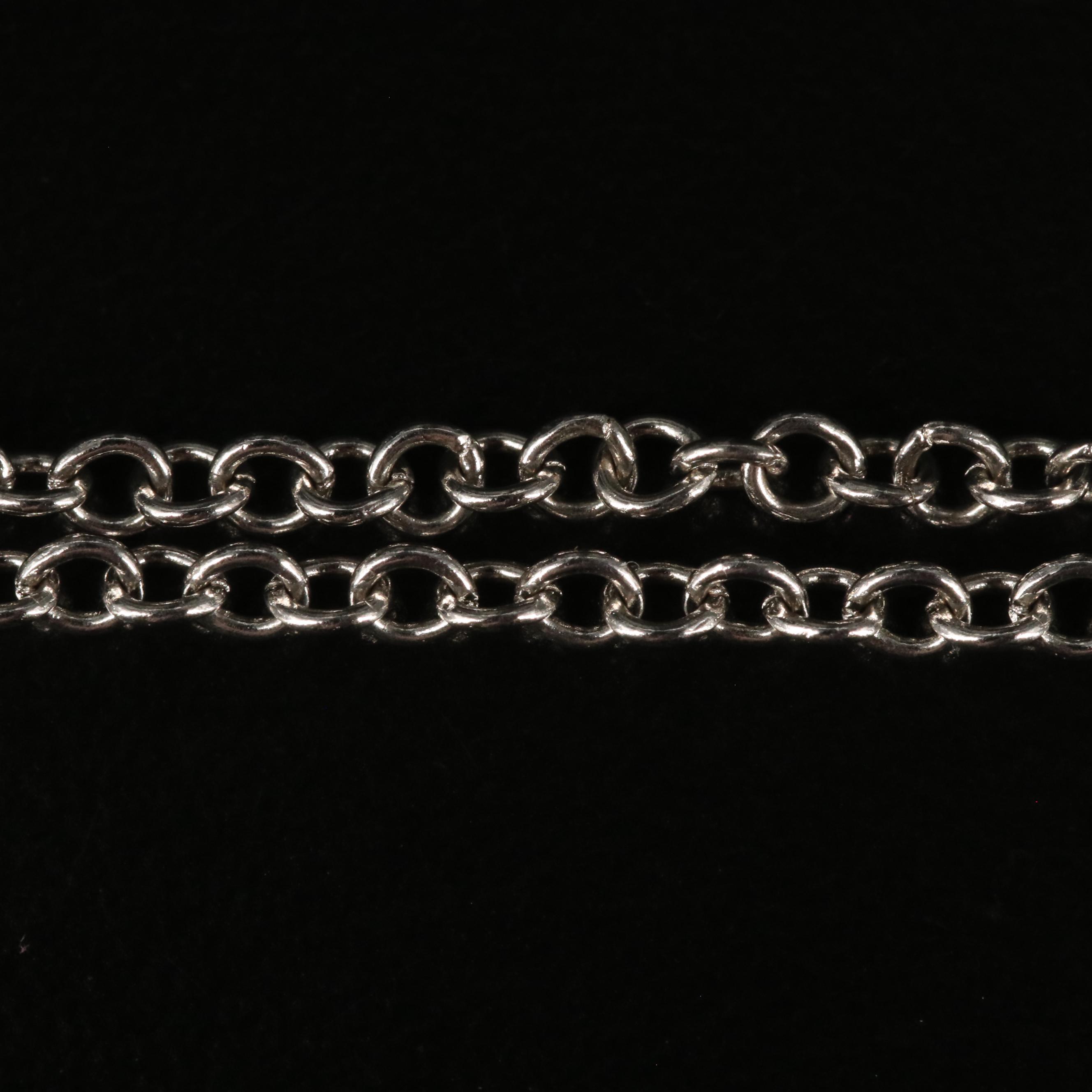 Sterling Garnet and Blue Topaz Charm Necklace