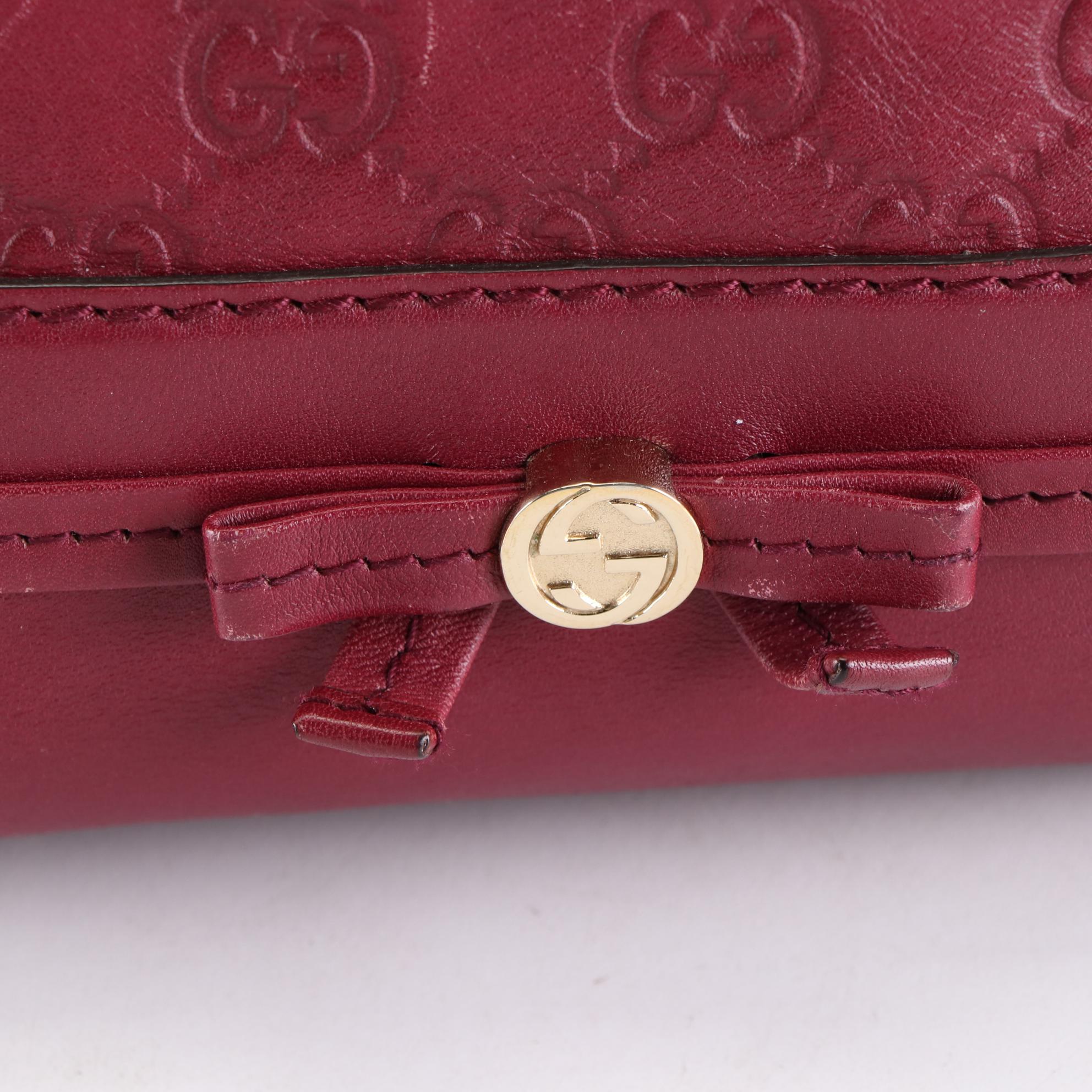 Gucci Mayfair Top Handle Bag in Burgundy Guccissima Leather
