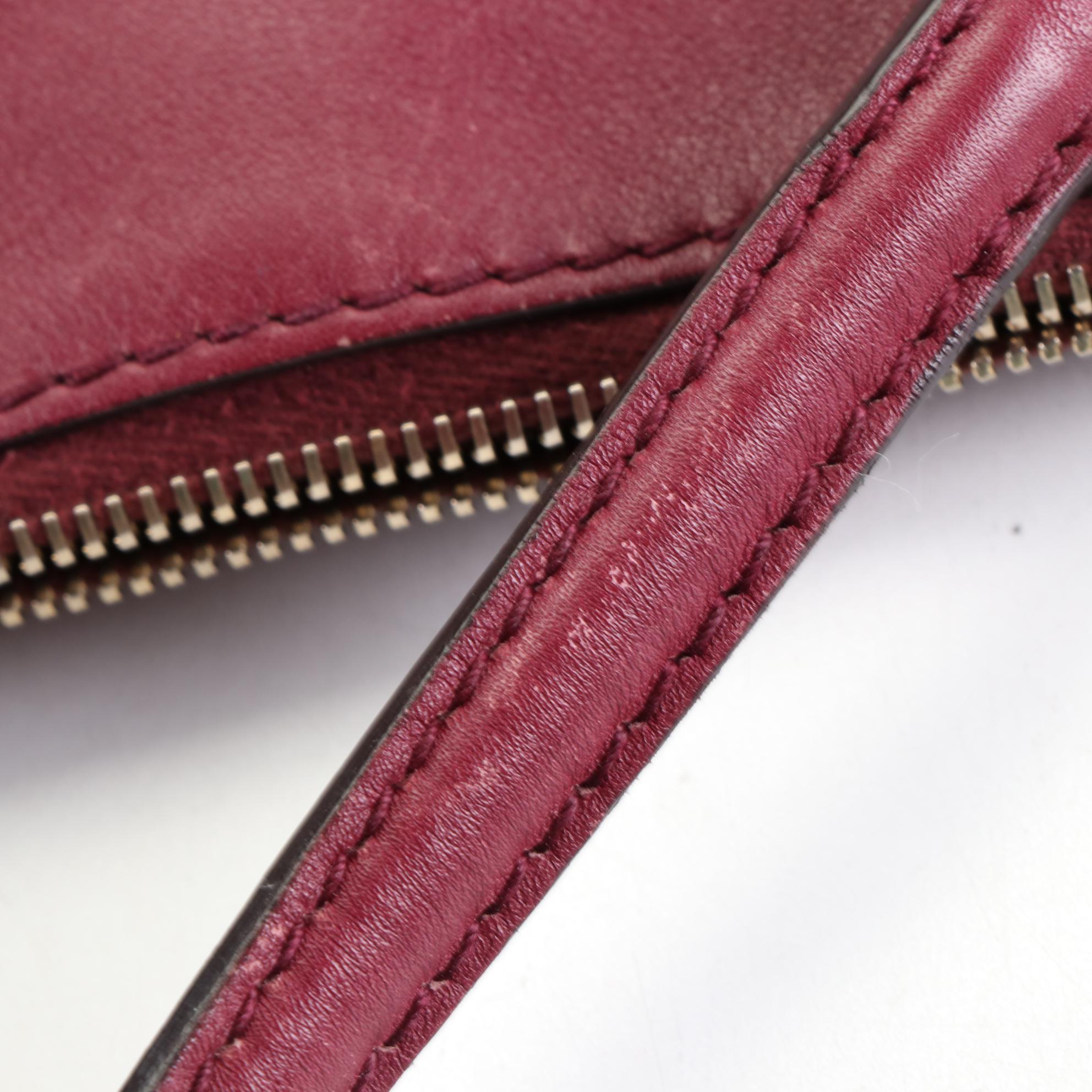 Gucci Mayfair Top Handle Bag in Burgundy Guccissima Leather