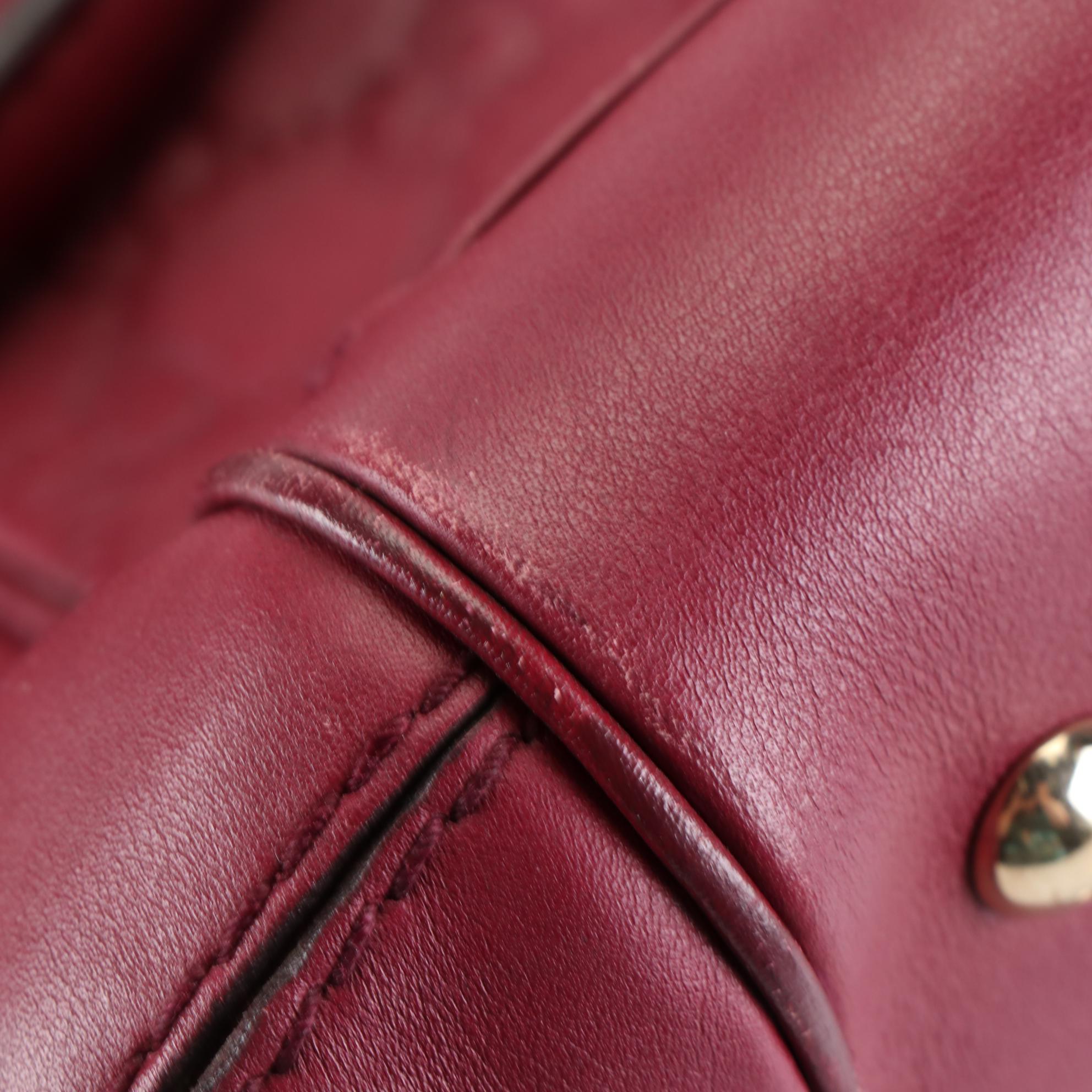 Gucci Mayfair Top Handle Bag in Burgundy Guccissima Leather