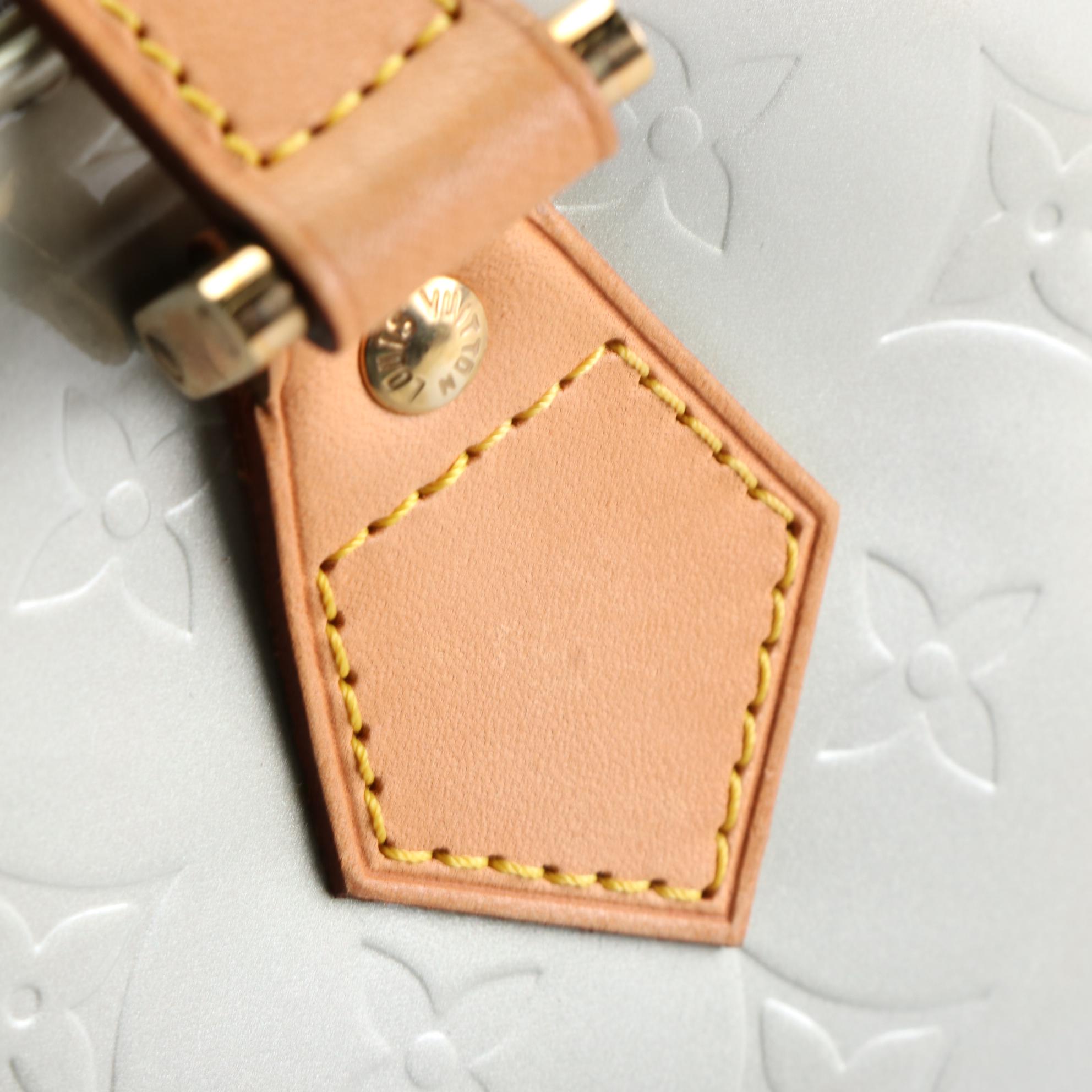 Louis Vuitton Houston Bag in Monogram Vernis and Vachetta Leather