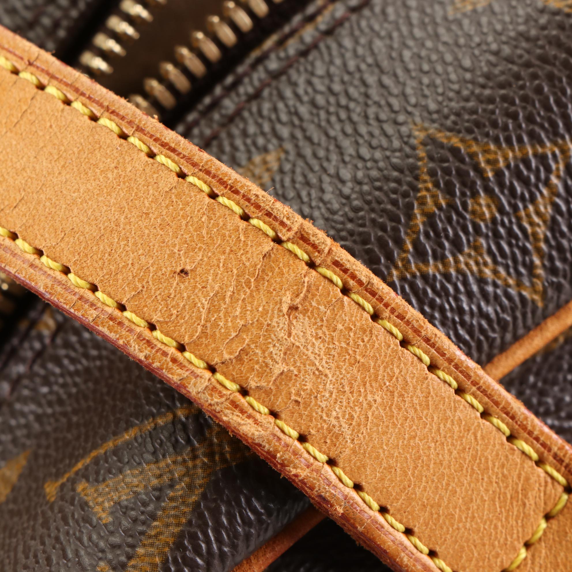 Louis Vuitton Cité GM Shoulder Bag in Monogram Canvas and Leather