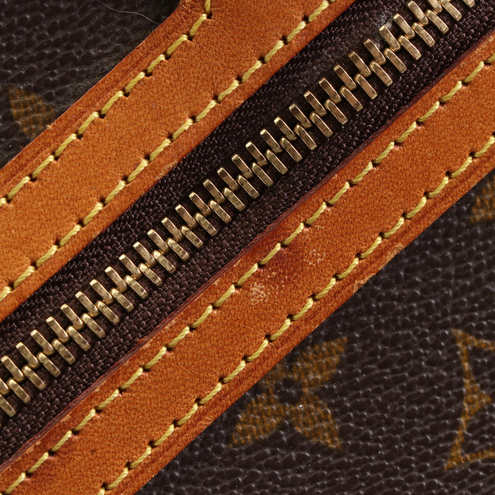 Louis Vuitton Cité GM Shoulder Bag in Monogram Canvas and Leather