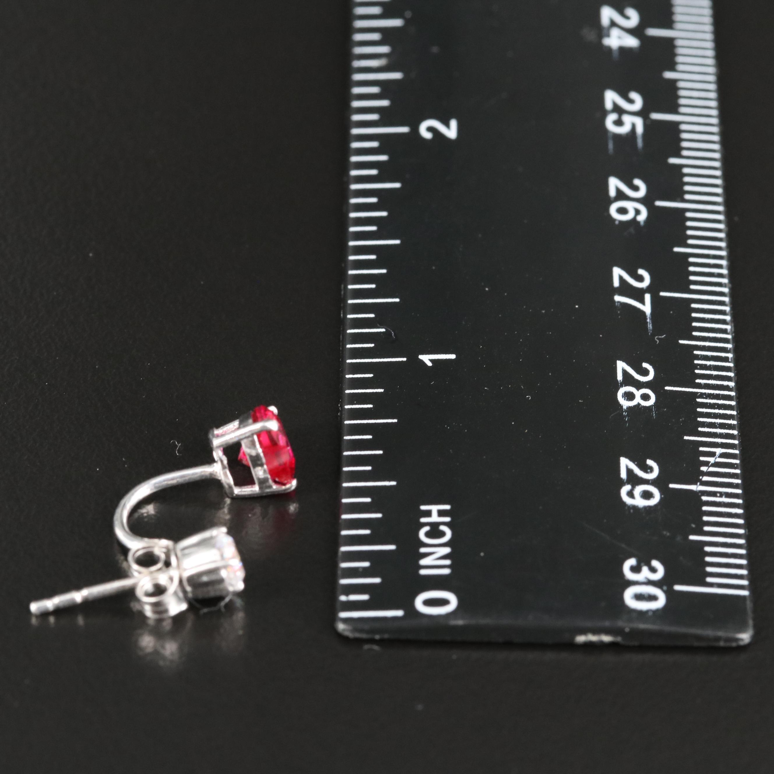 Sterling Cubic Zirconia Stud Earrings with Ruby Enhancers