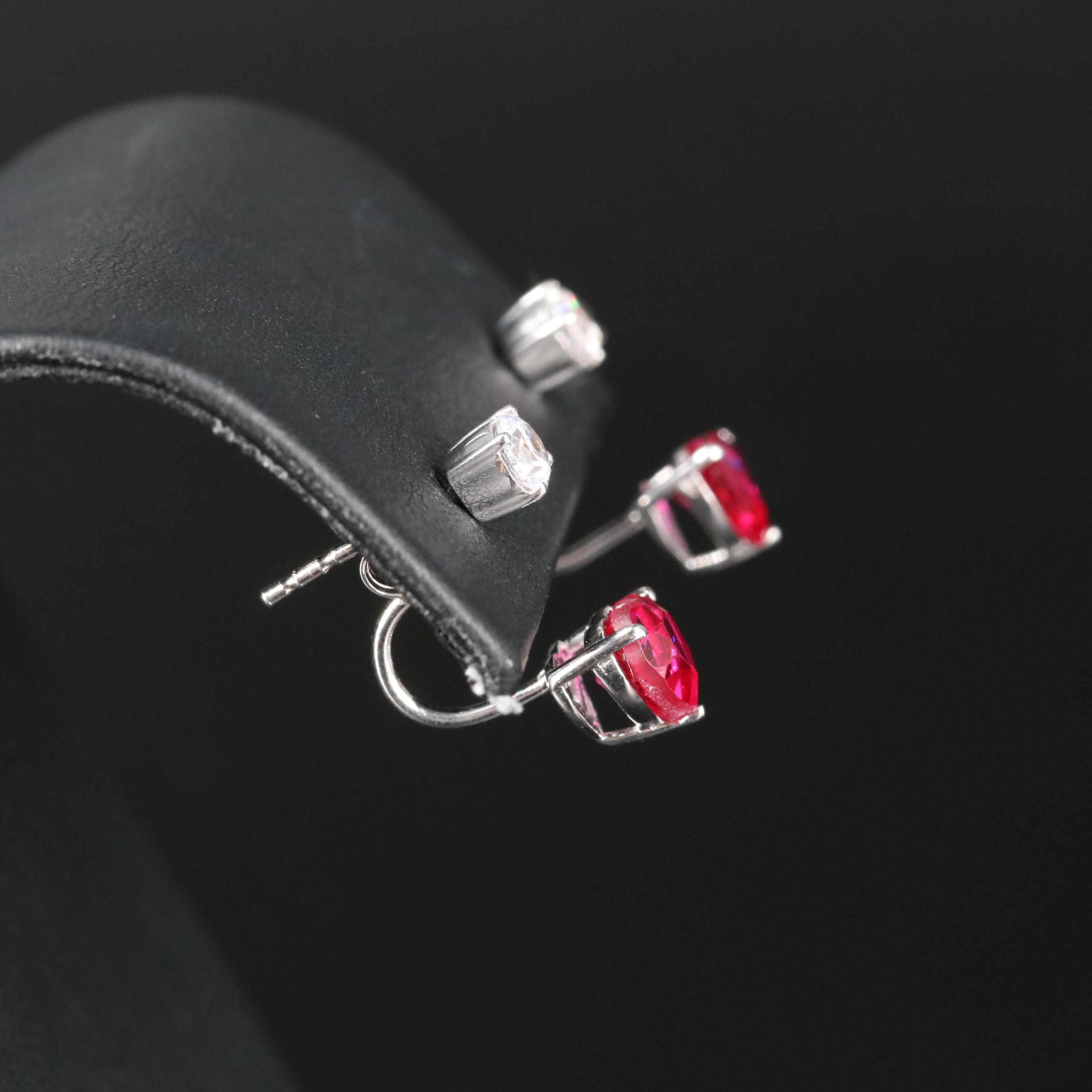 Sterling Cubic Zirconia Stud Earrings with Ruby Enhancers