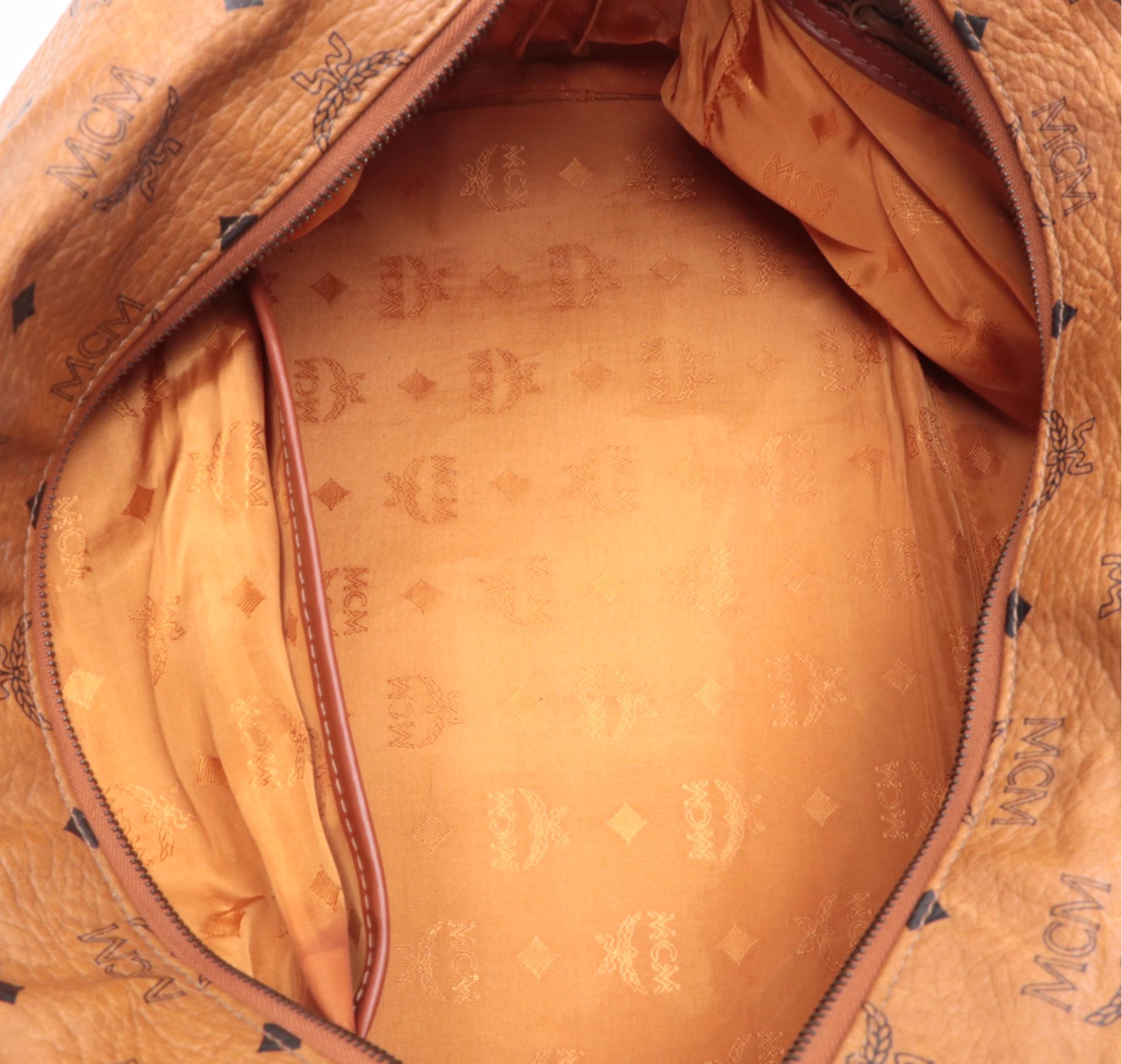 MCM Small Duffle Bag in Cognac Visetos Monogram Canvas and Leather