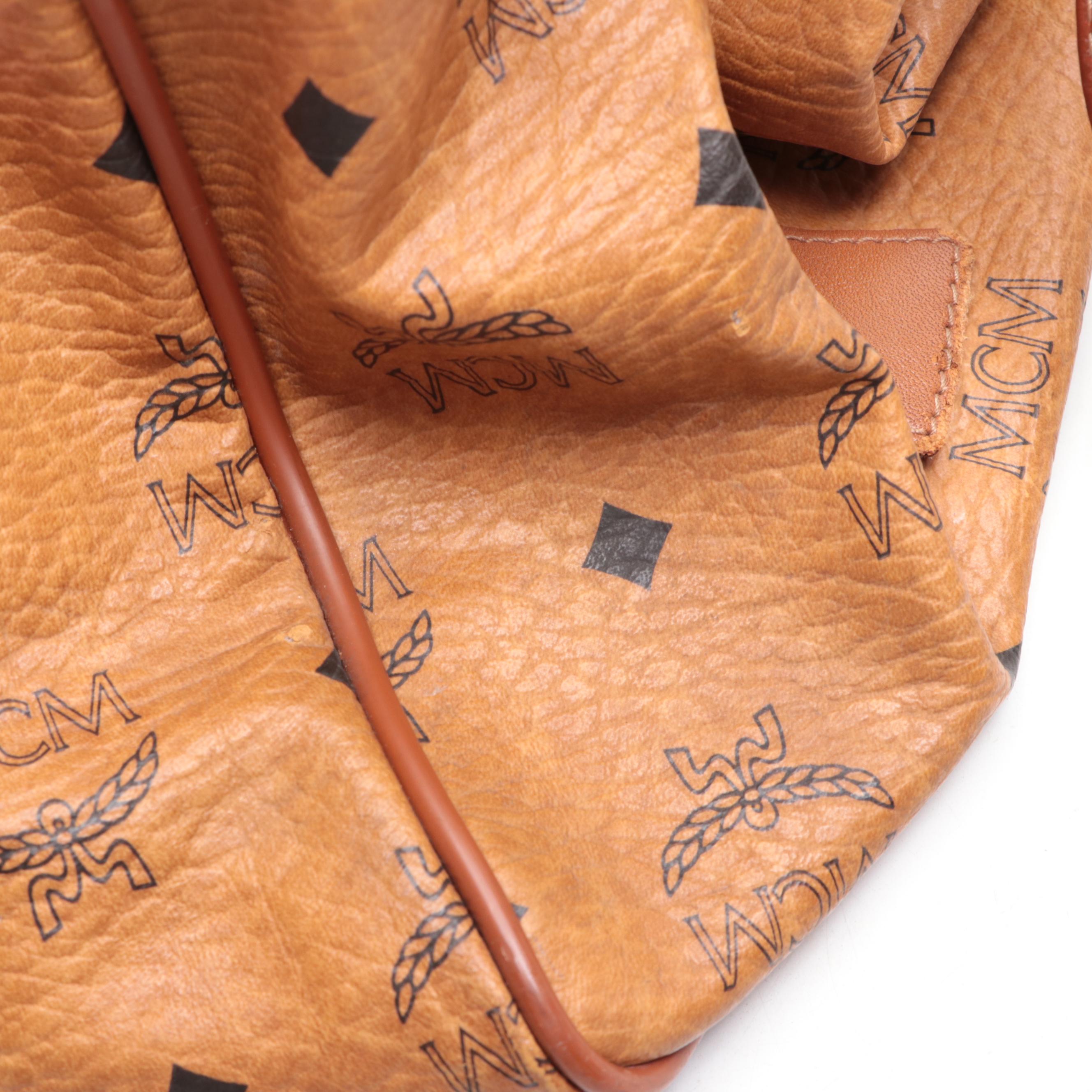 MCM Small Duffle Bag in Cognac Visetos Monogram Canvas and Leather