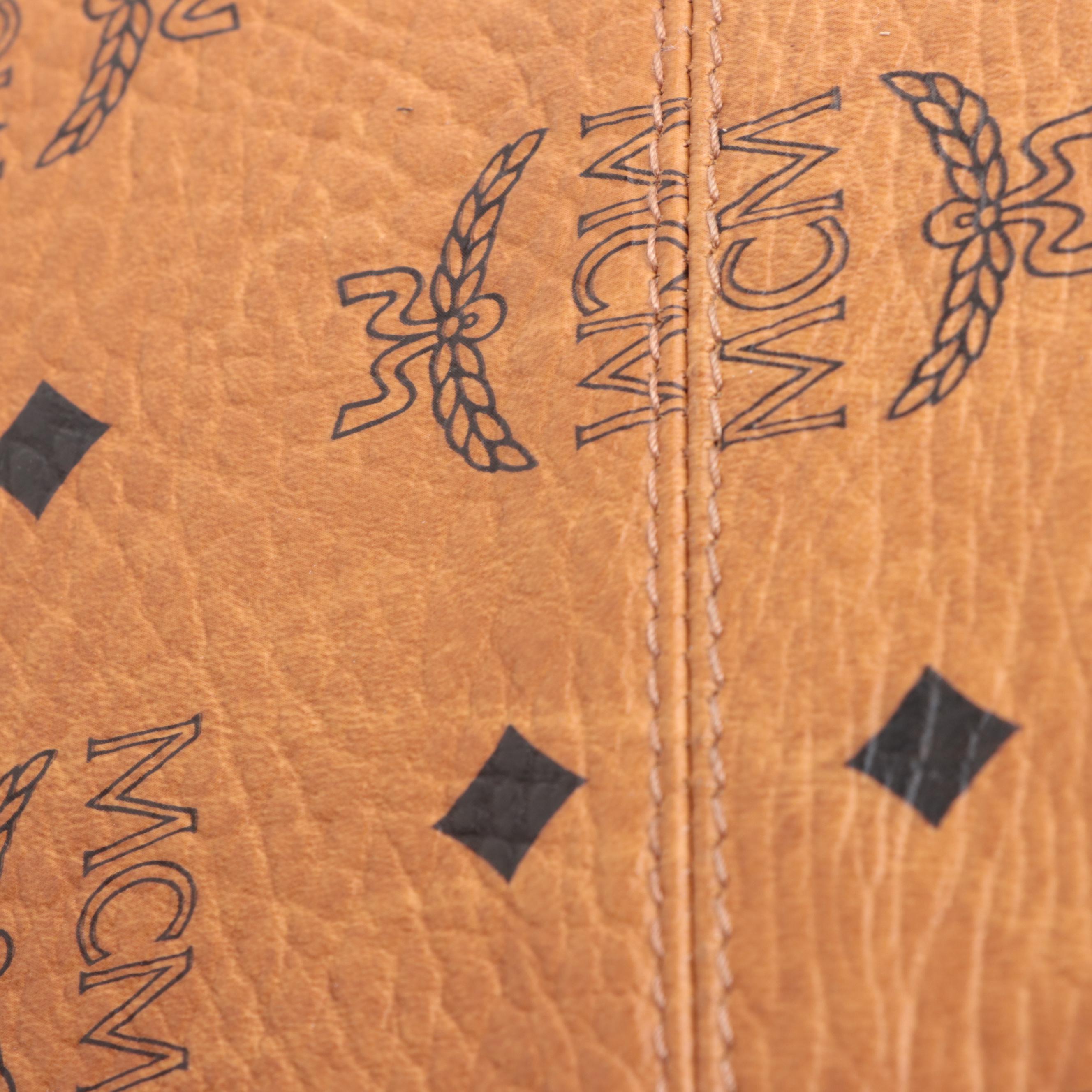 MCM Small Duffle Bag in Cognac Visetos Monogram Canvas and Leather