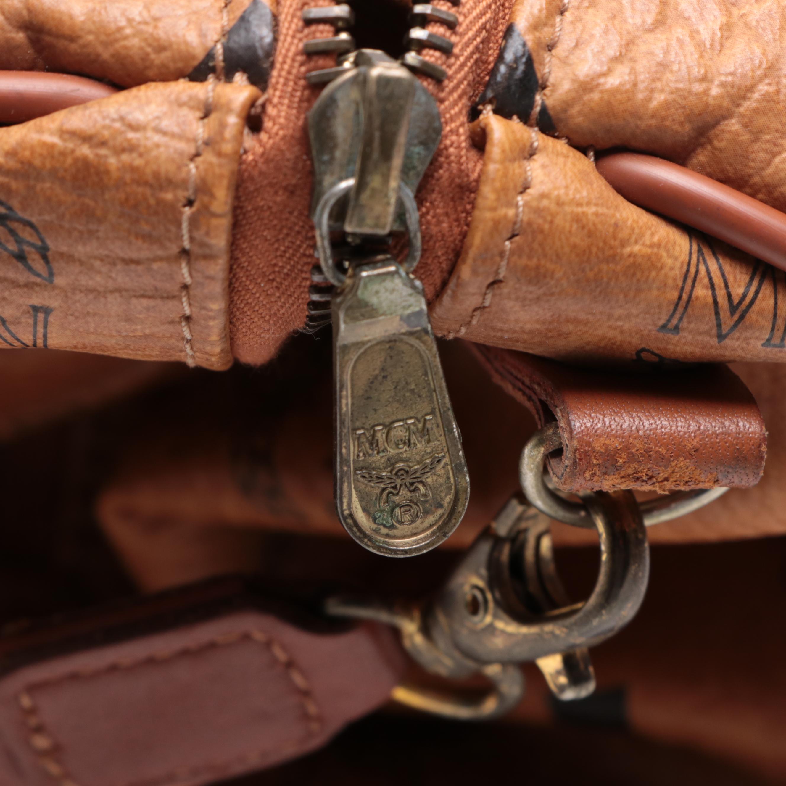 MCM Small Duffle Bag in Cognac Visetos Monogram Canvas and Leather