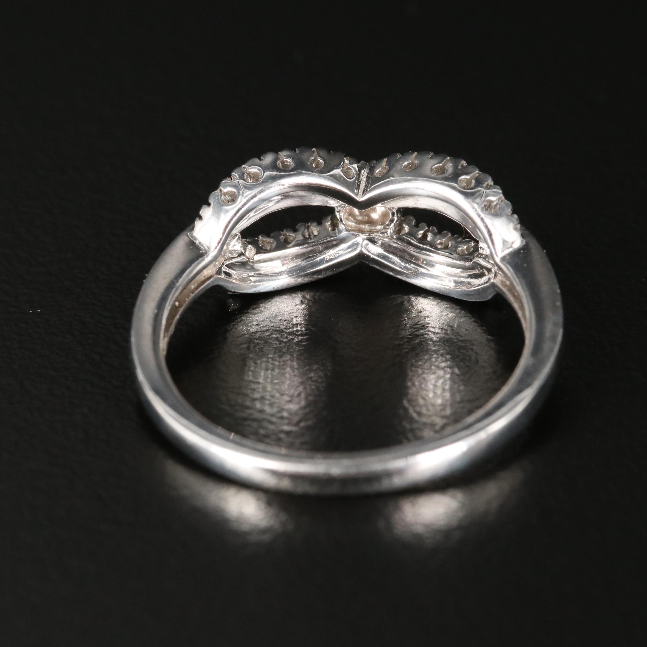 14K 0.25 CTW Diamond Infinity Ring