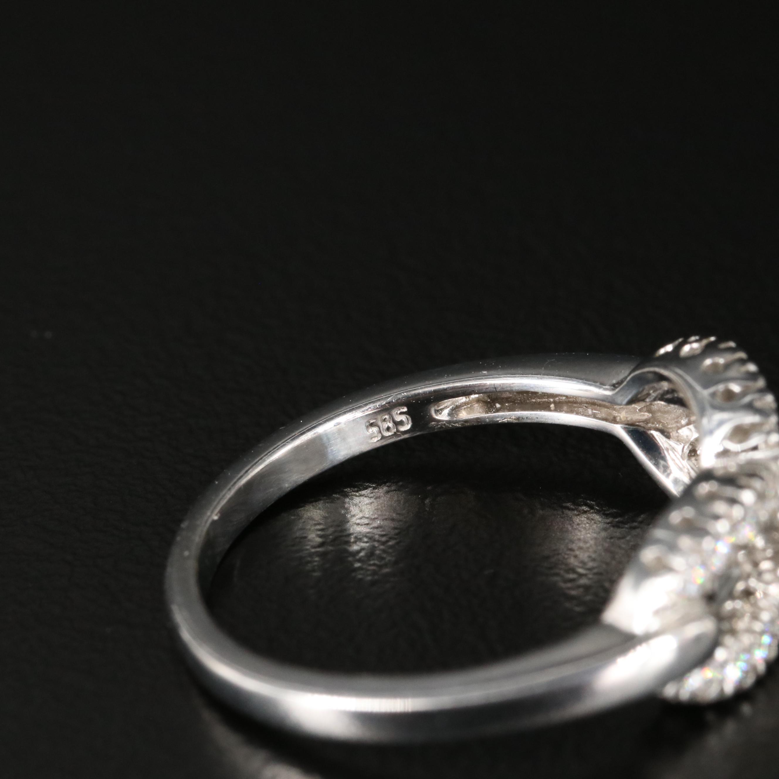 14K 0.25 CTW Diamond Infinity Ring