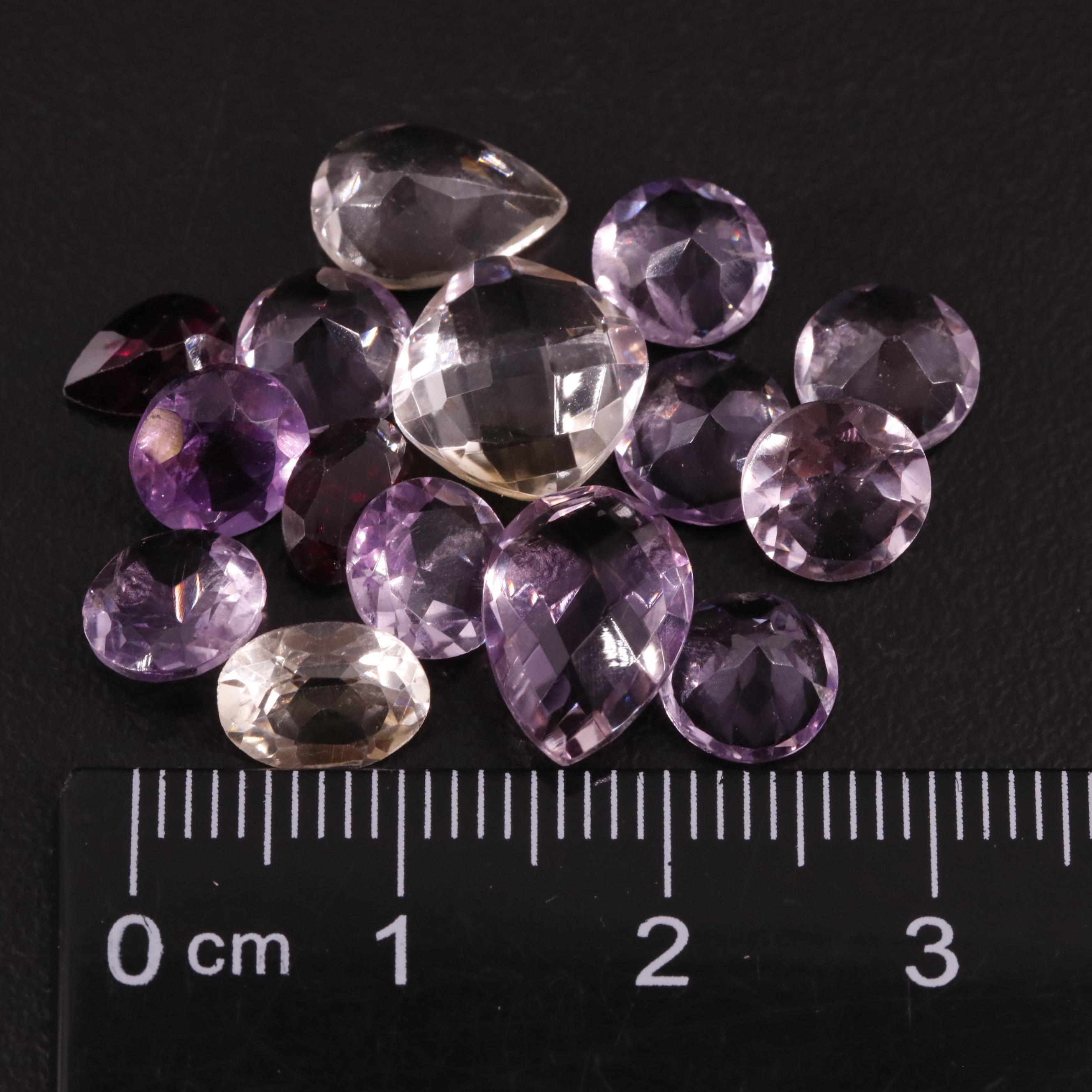 Loose 18.72 CTW Amethyst, Citrine, and Garnet Lot