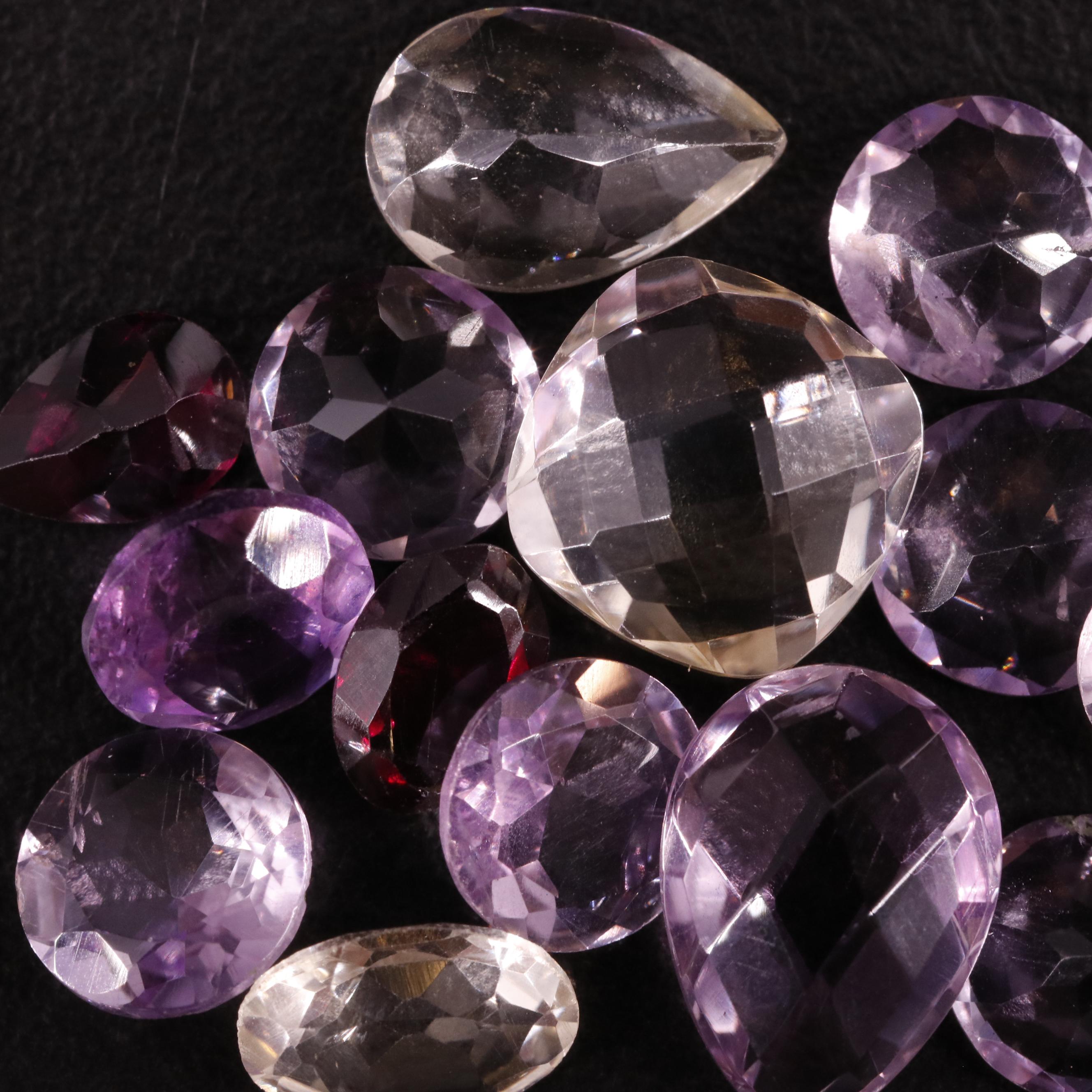 Loose 18.72 CTW Amethyst, Citrine, and Garnet Lot