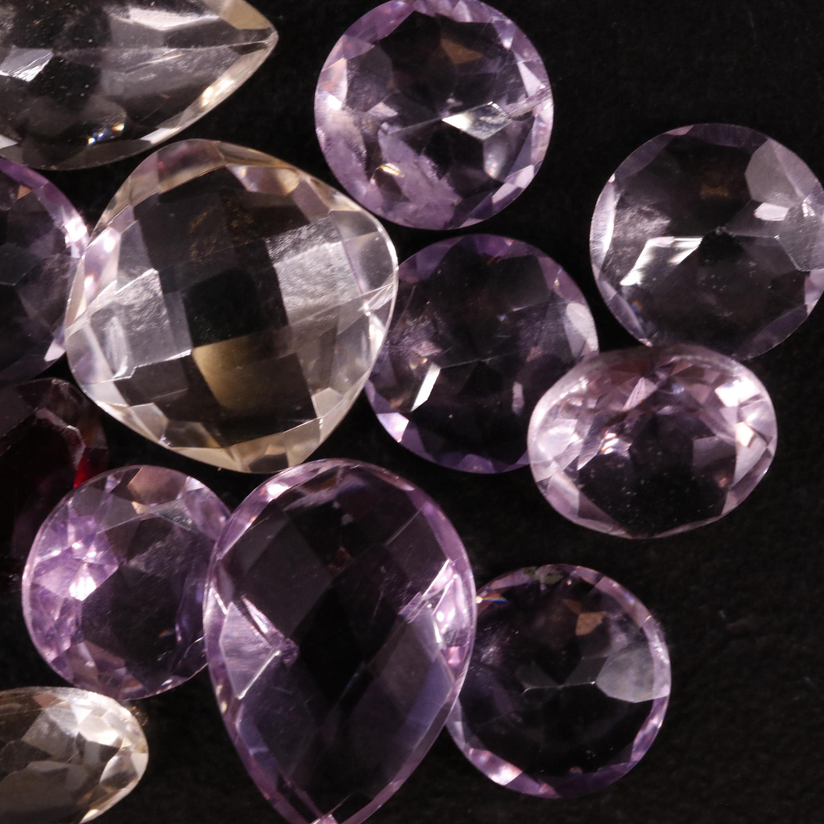 Loose 18.72 CTW Amethyst, Citrine, and Garnet Lot