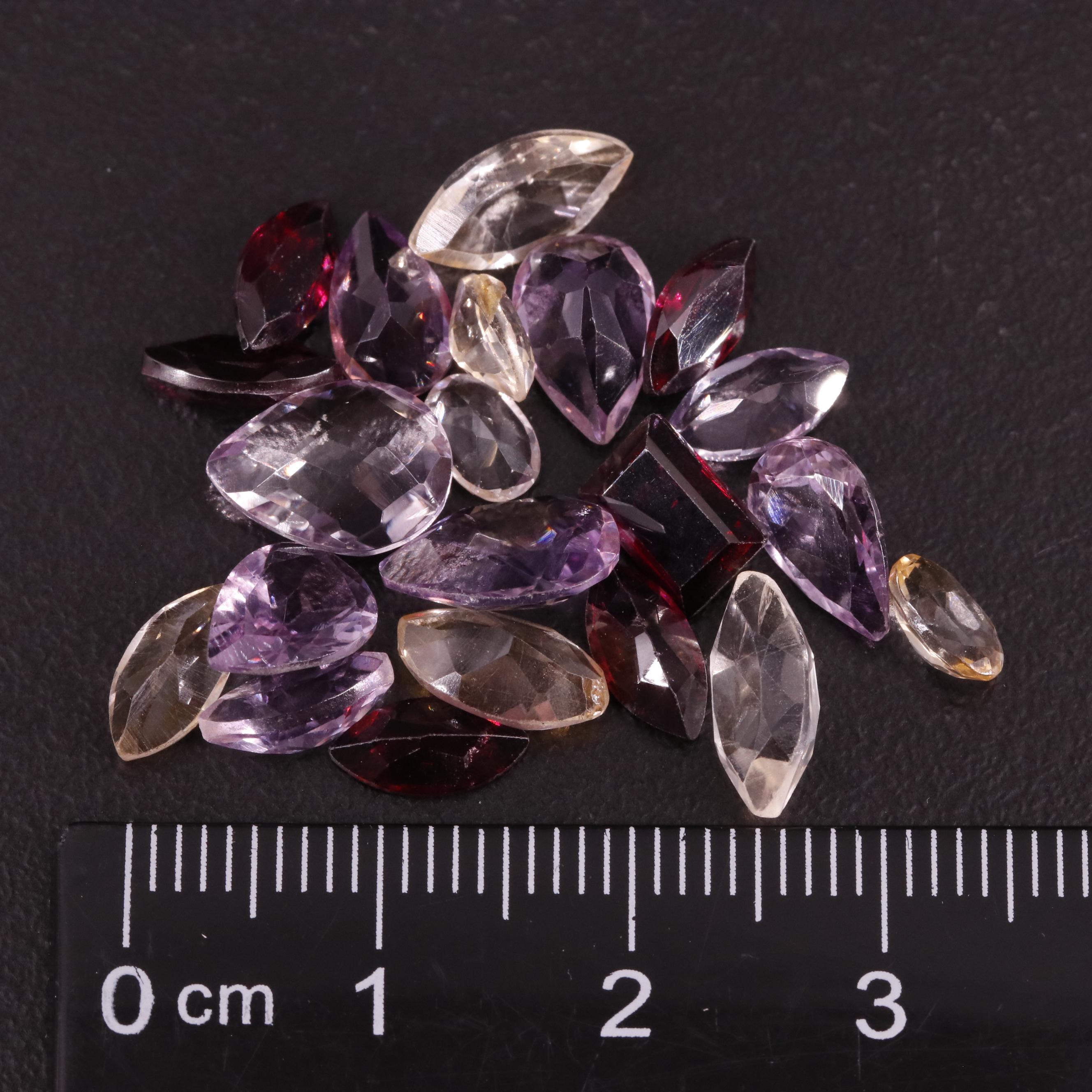 Loose 18.18 CTW Amethyst, Citrine, and Garnet Lot