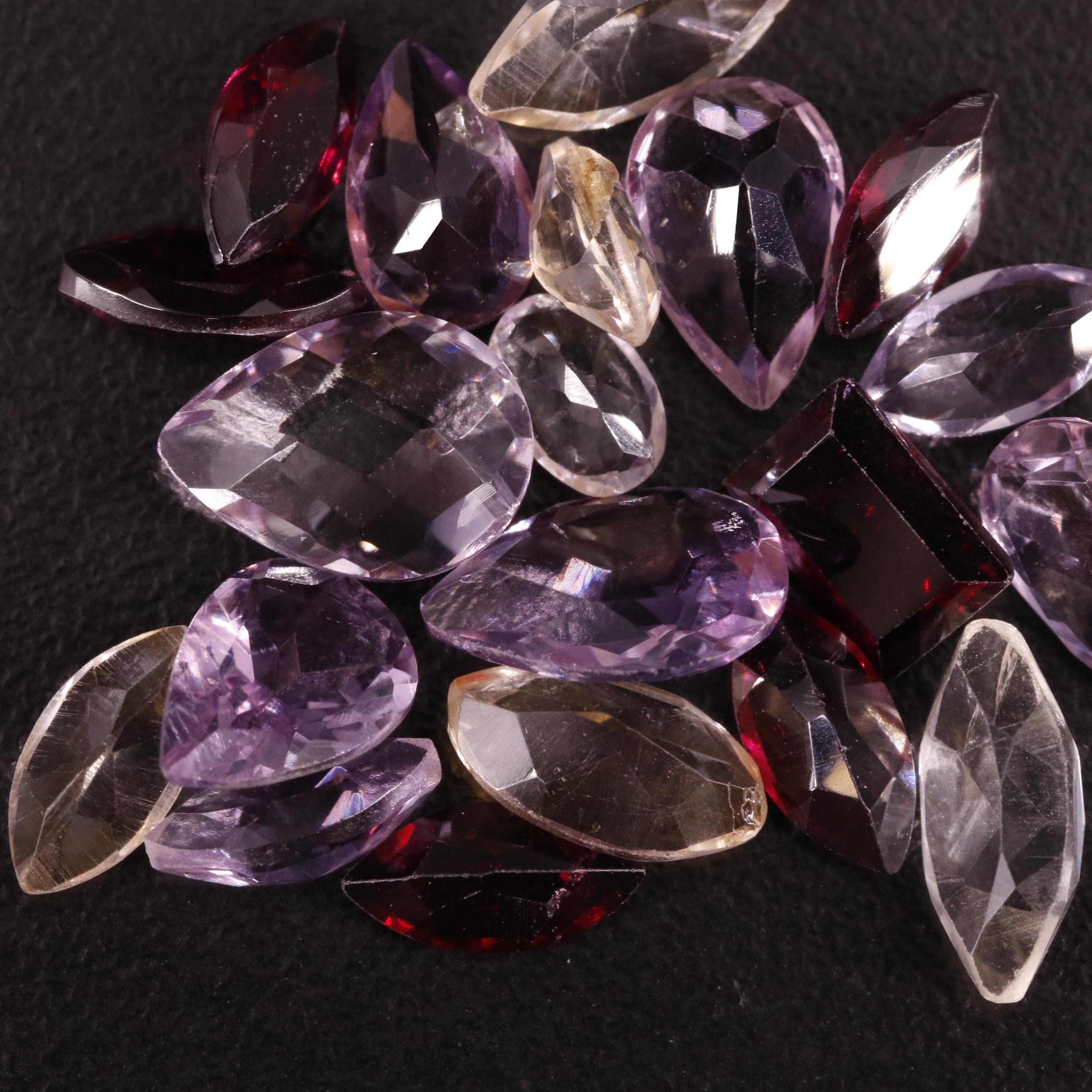 Loose 18.18 CTW Amethyst, Citrine, and Garnet Lot