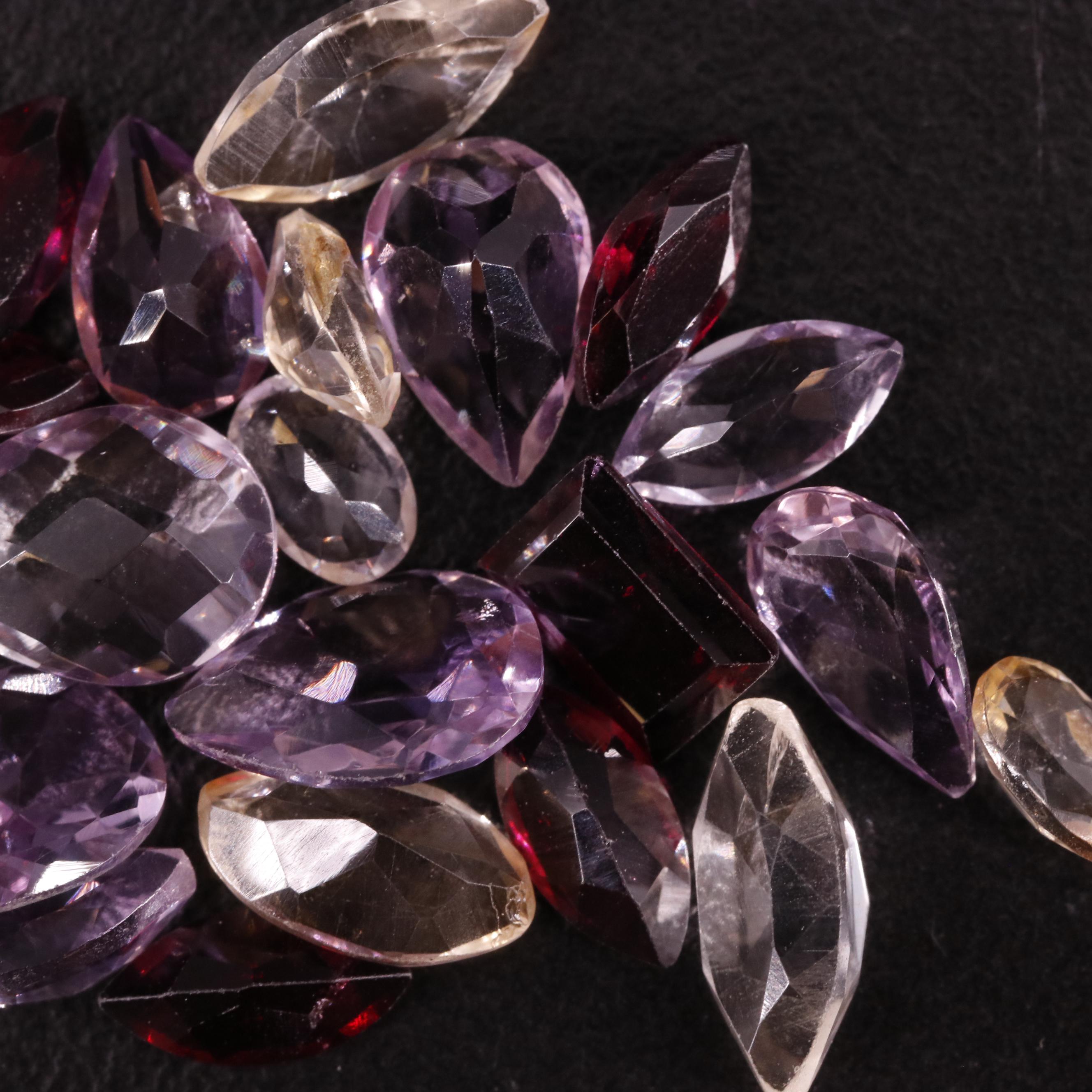 Loose 18.18 CTW Amethyst, Citrine, and Garnet Lot