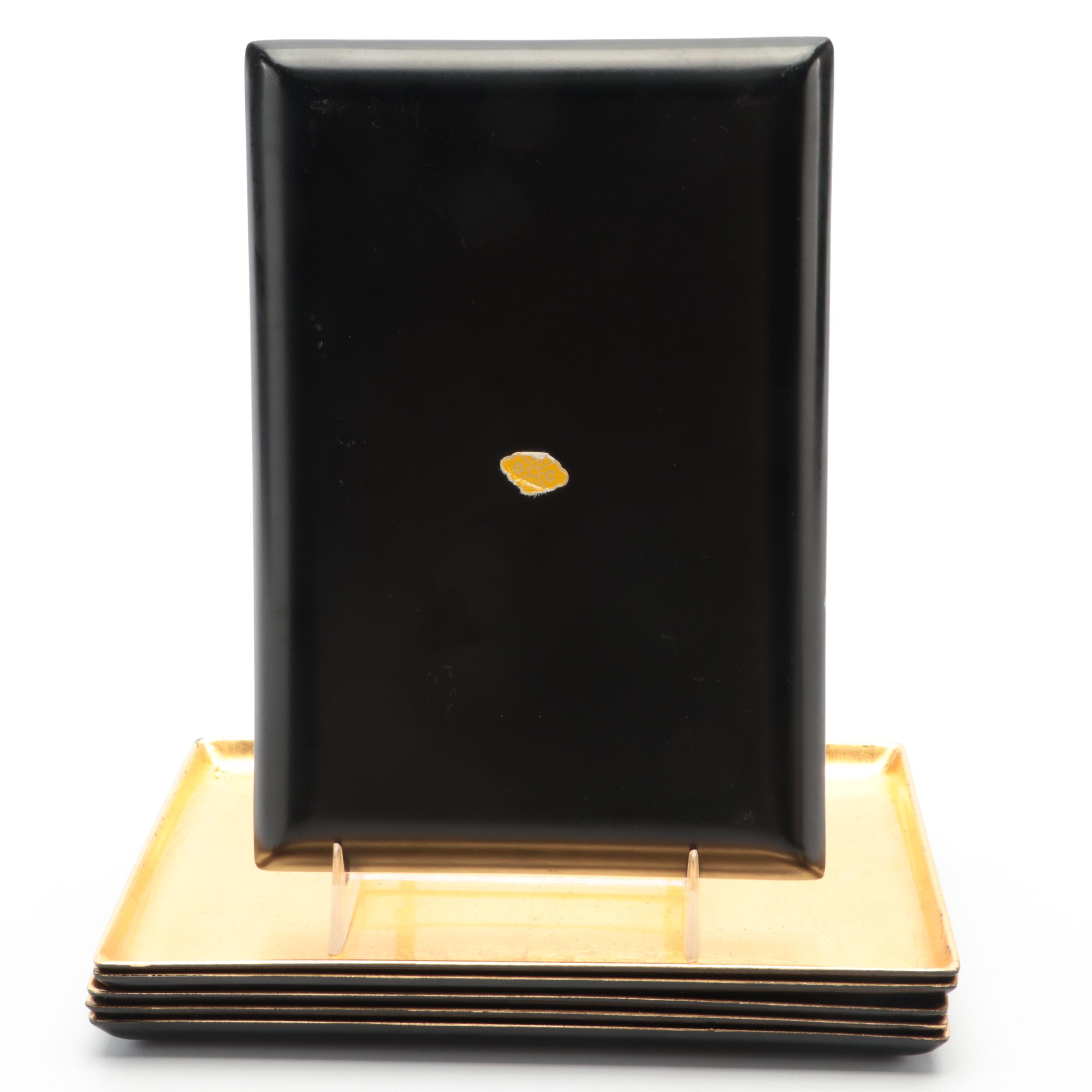 Gilt Lacquerware Plates and Trays with Gilt Accented Amethyst Glass Vase