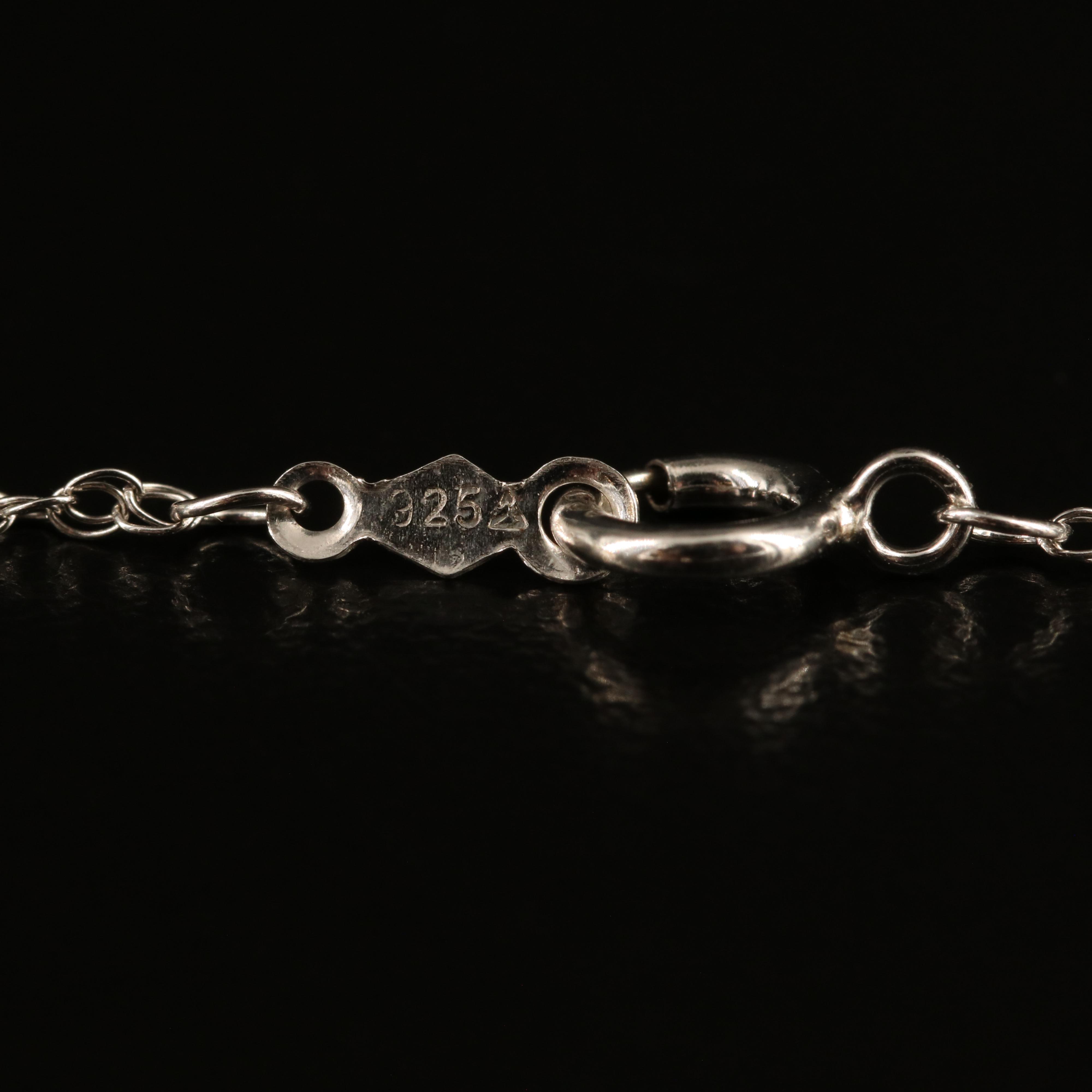 Sterling Ruby and Cubic Zirconia "Love" Necklace