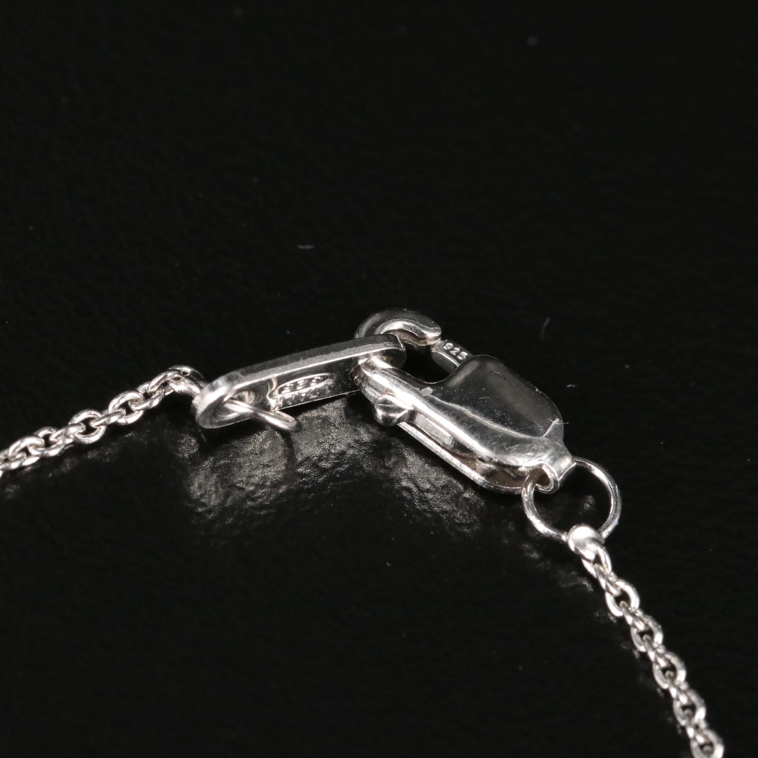 Sterling Ruby and White Sapphire Dolphin Pendant Necklace