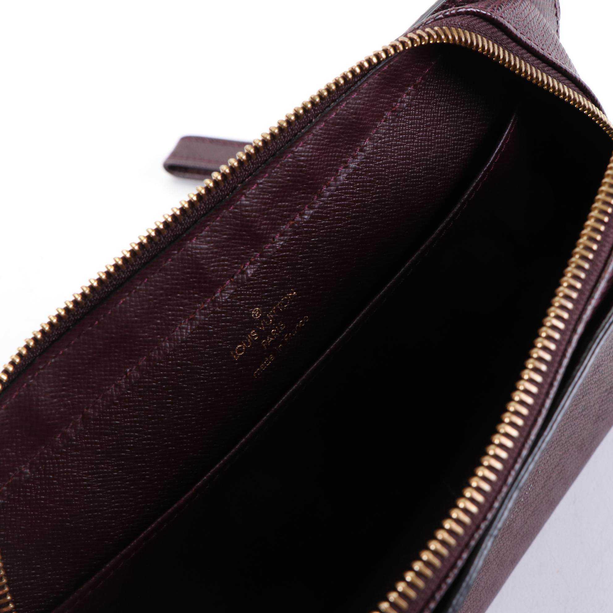 Louis Vuitton Pochette Baïkal Clutch Bag in Taïga Leather