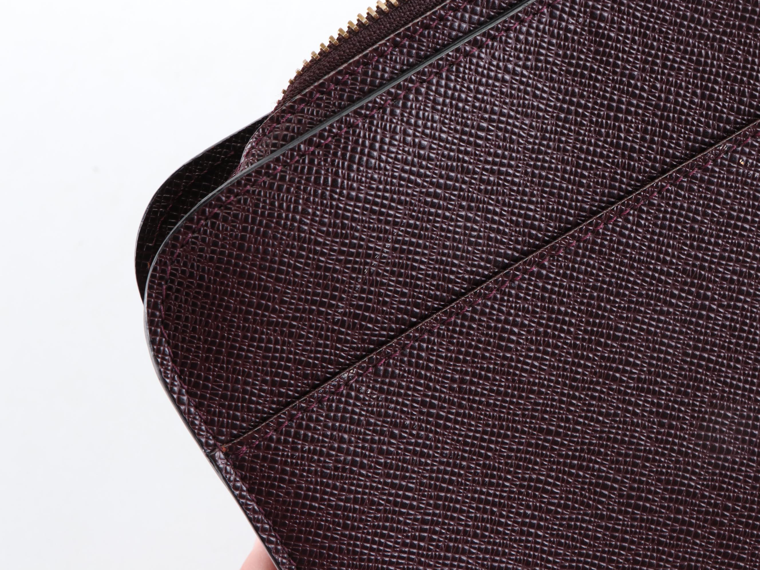 Louis Vuitton Pochette Baïkal Clutch Bag in Taïga Leather