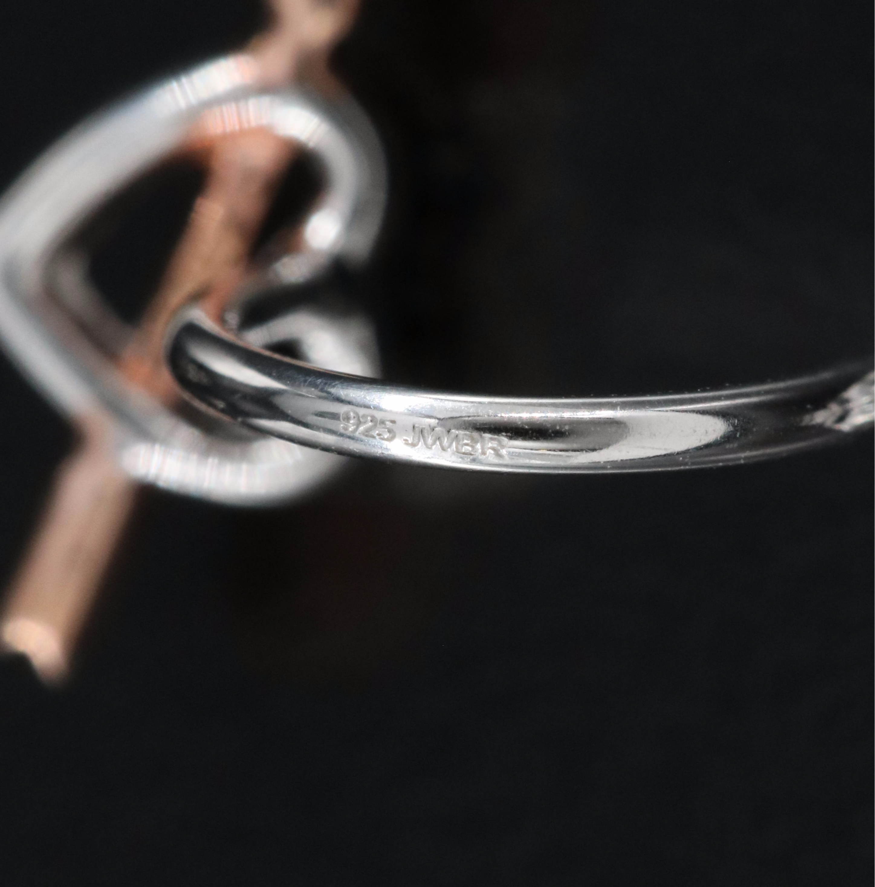 Sterling Amethyst Stud Earrings with Heart and Arrow Enhancers