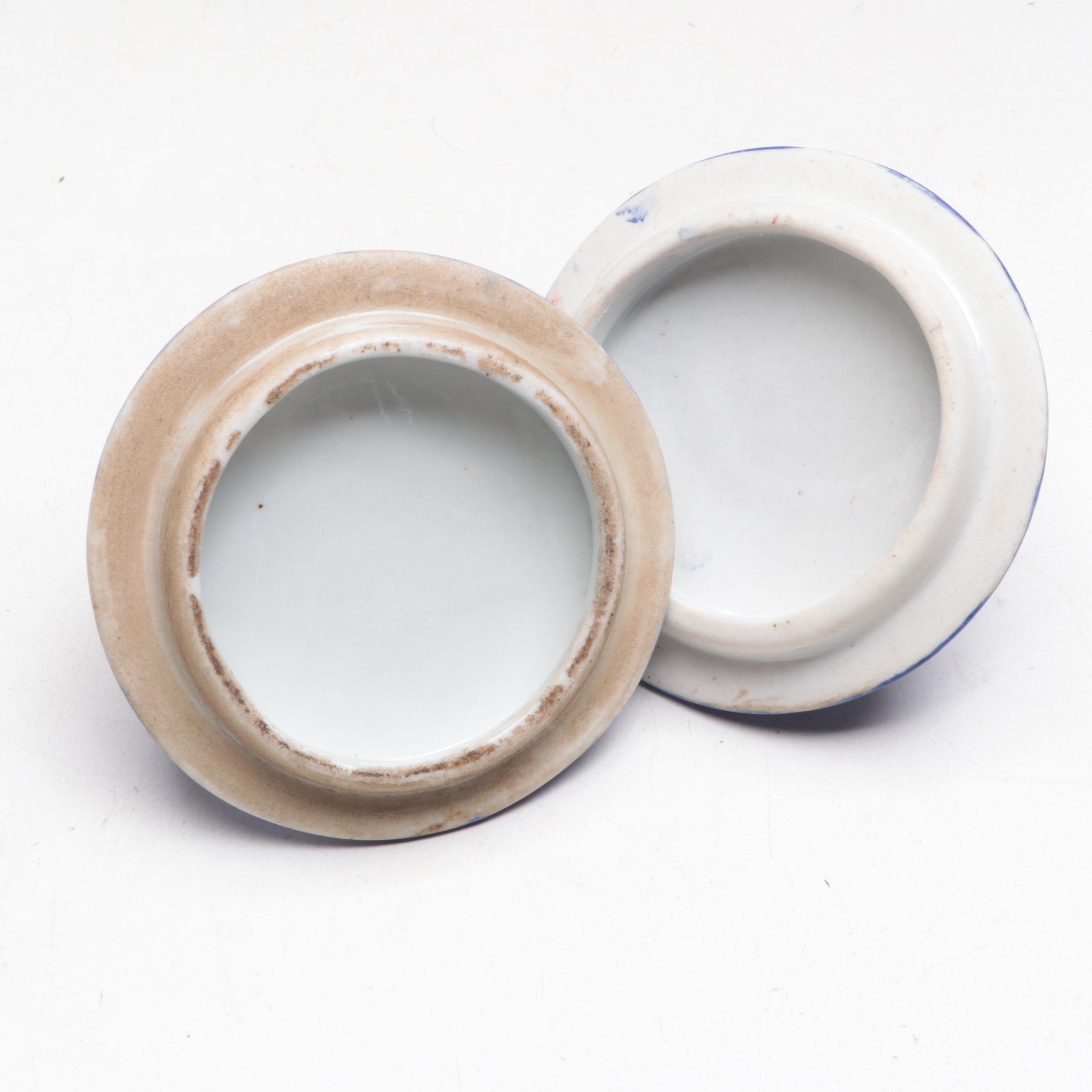 Pair of Chinese Enamel-Decorated Porcelain Covered Jars