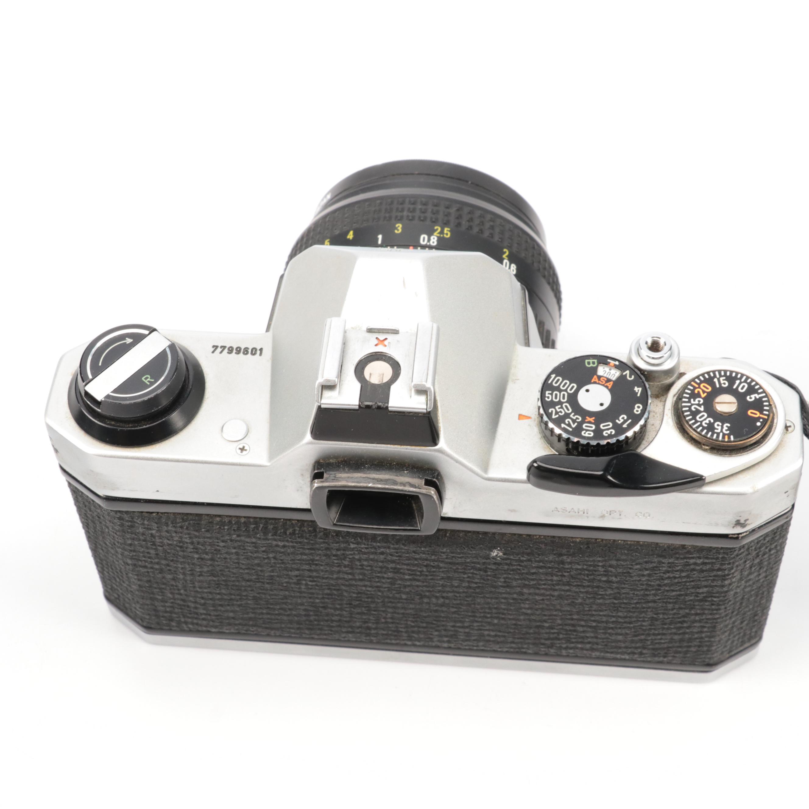 Canon A-1 and Pentax K1000 SLR Cameras with Sigma Lenses