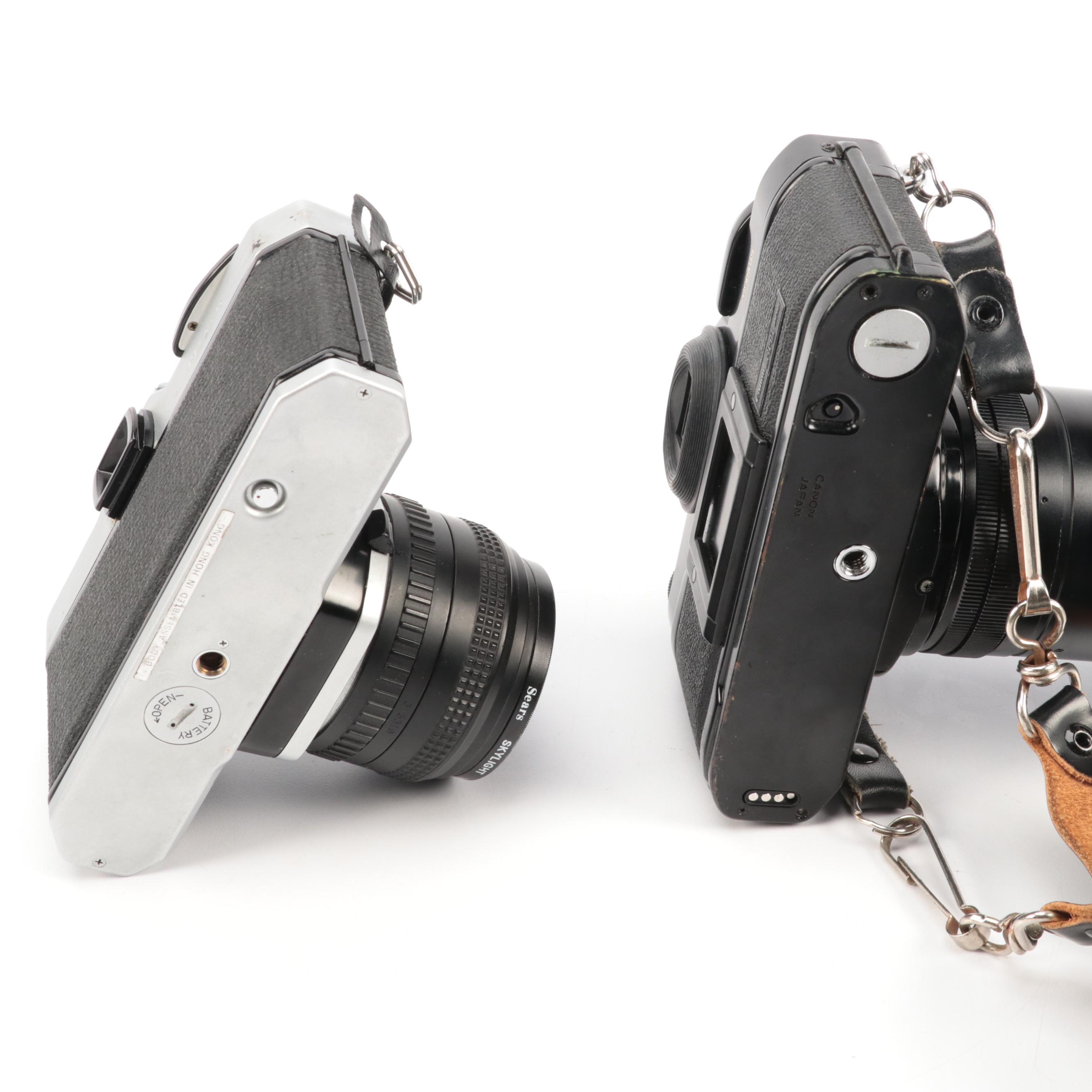 Canon A-1 and Pentax K1000 SLR Cameras with Sigma Lenses